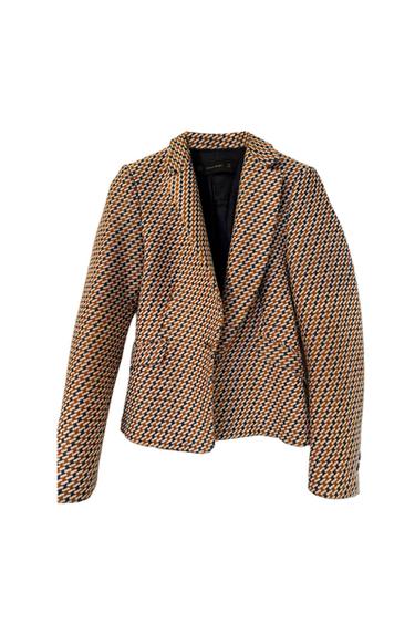 Printed jacket in brown, blue, and white tones with lapels and front pockets. Visible interior label: "ZARA BASIC".
