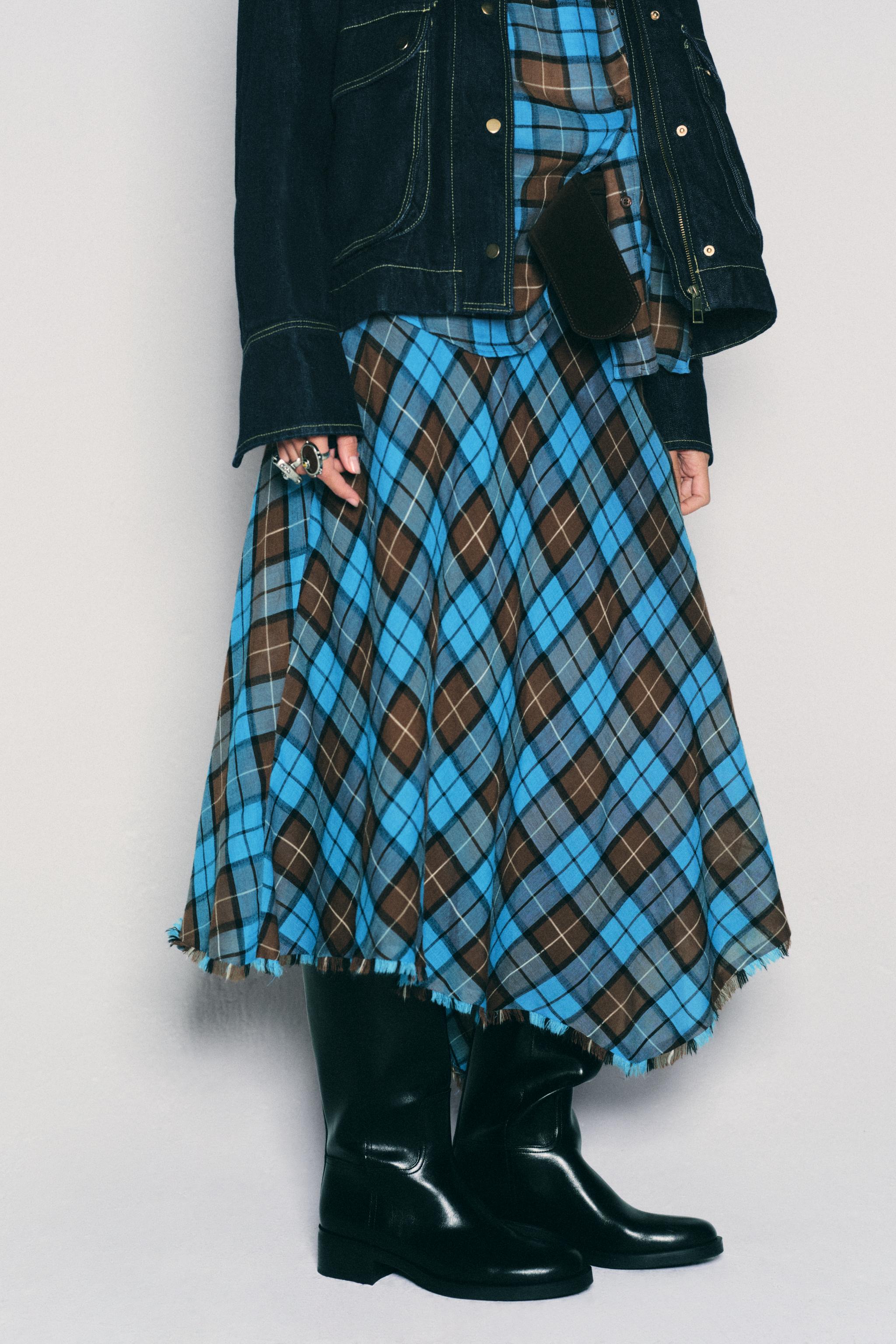 PRINTED ASYMMETRIC BELTED SKIRT