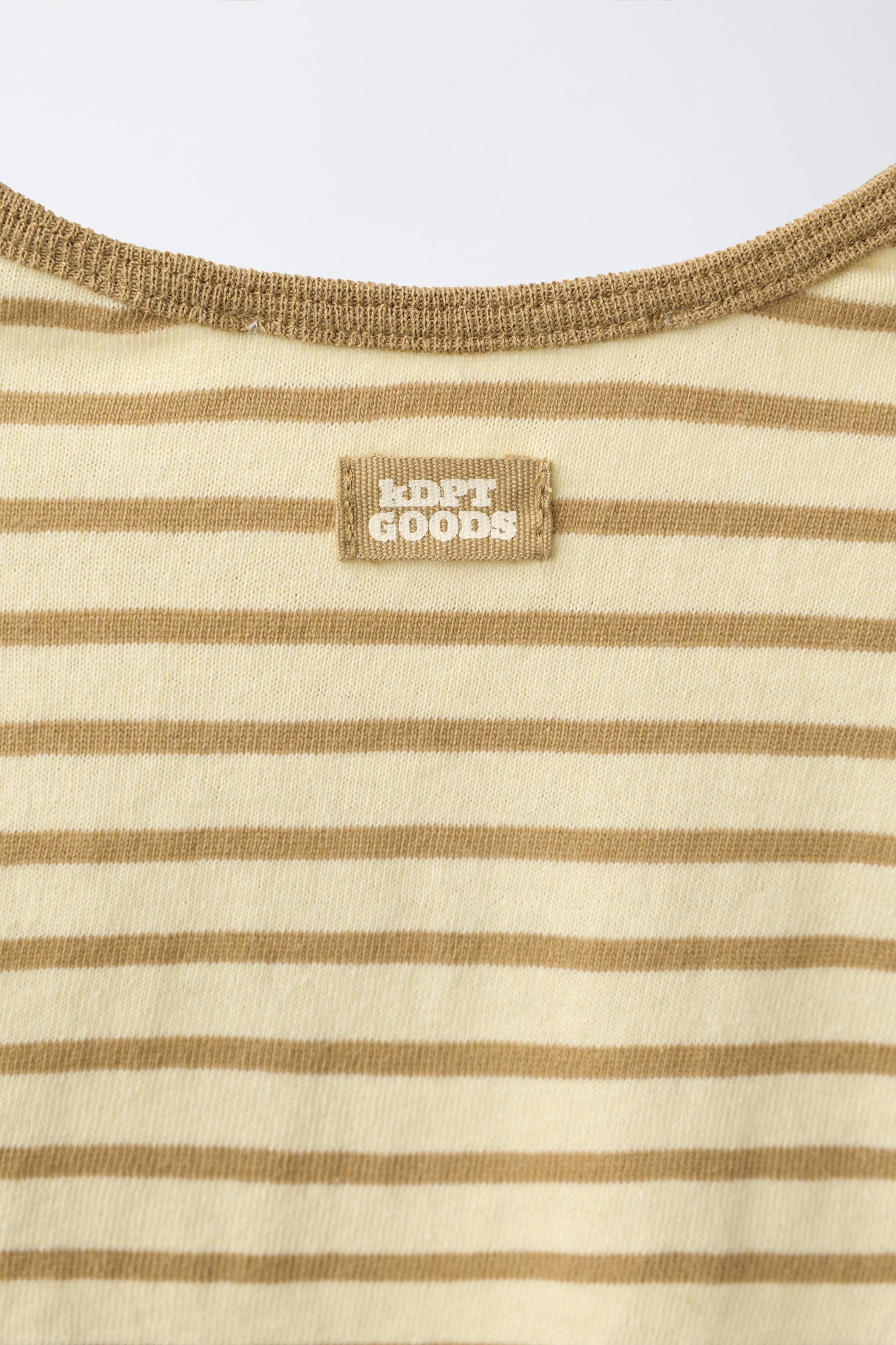 T-SHIRT RAYÉ AVEC ÉTIQUETTE