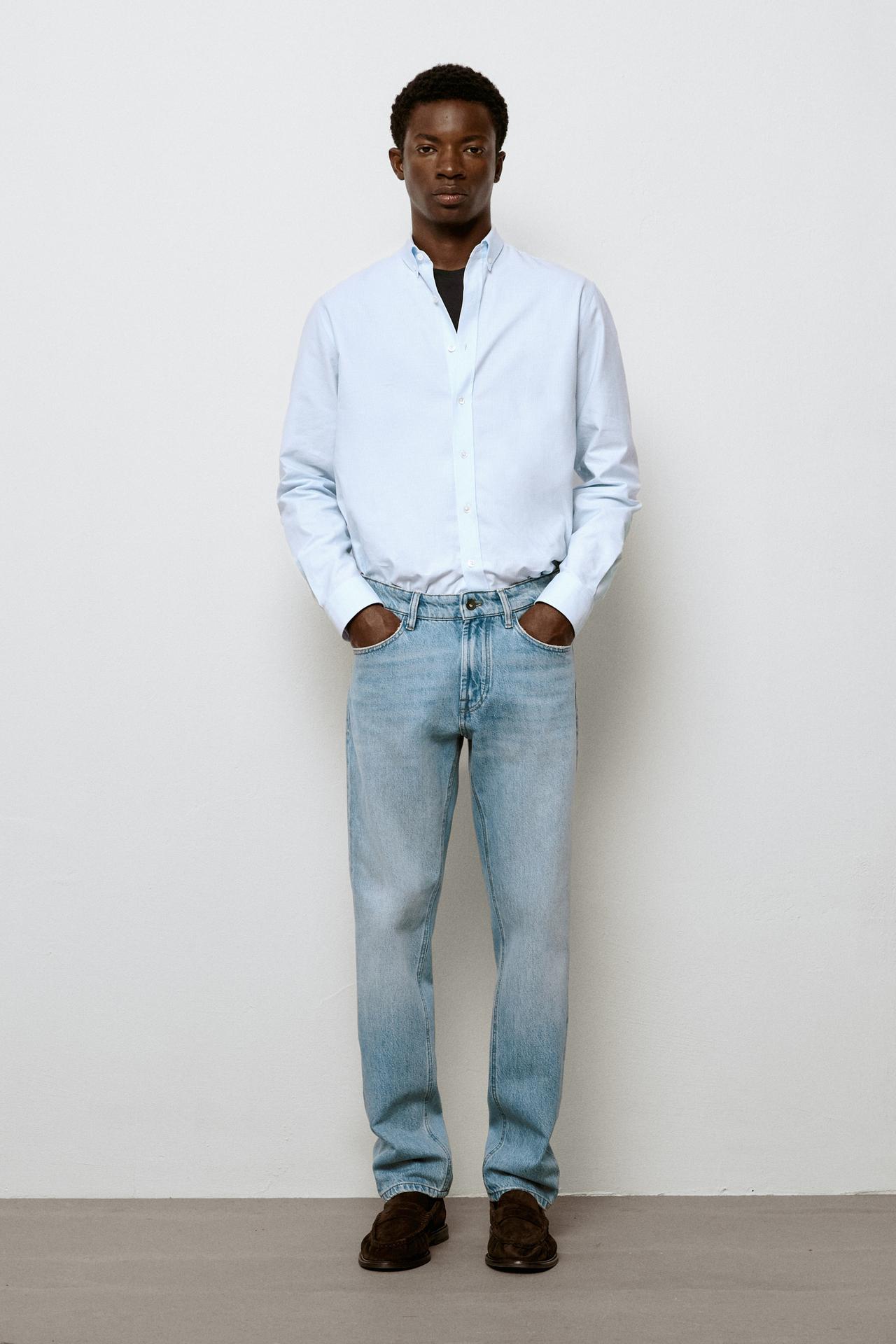 Bleach washed tapered fit jeans — Light blue
