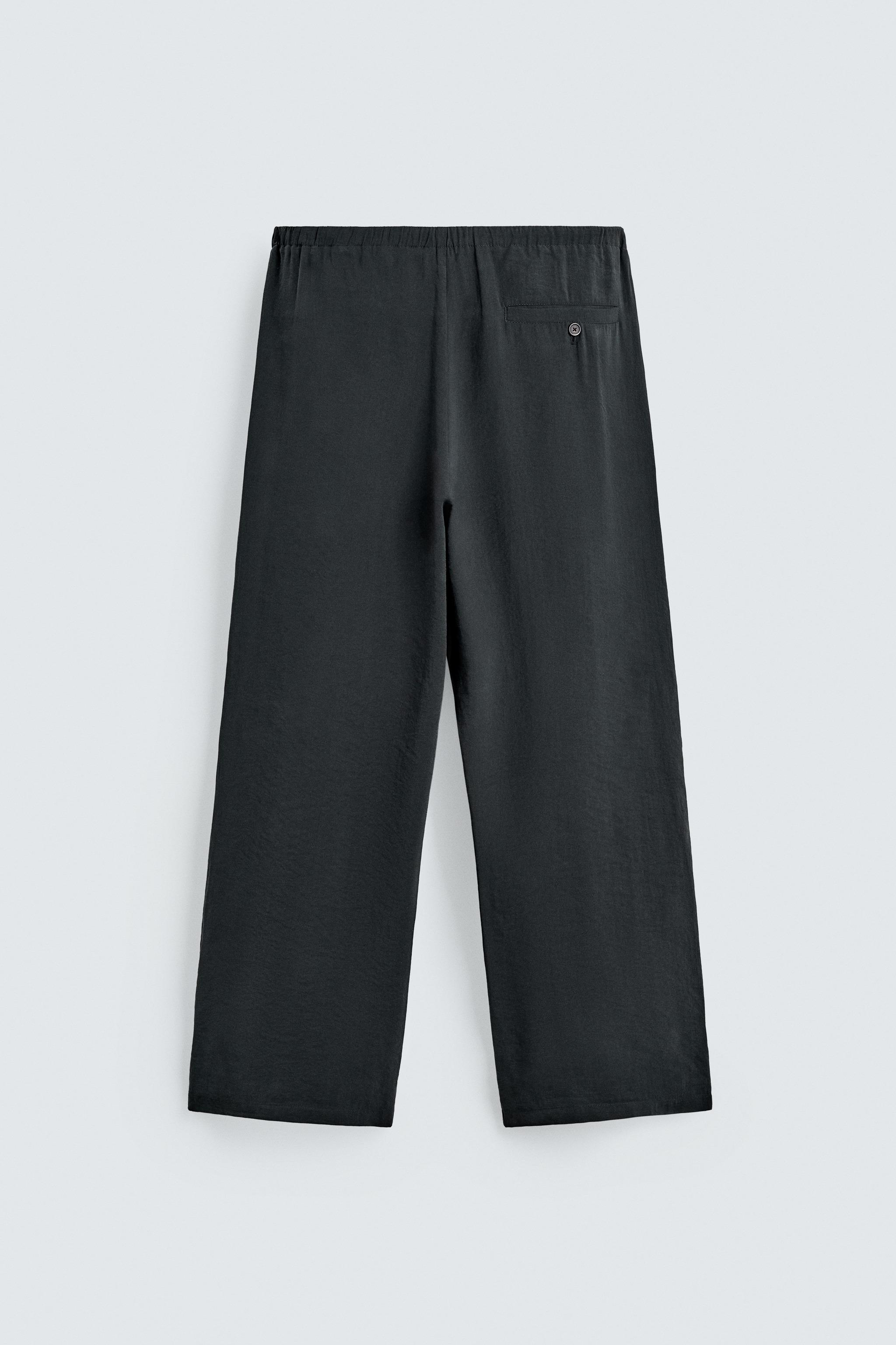 RELAXED FIT FLOWY PANTS