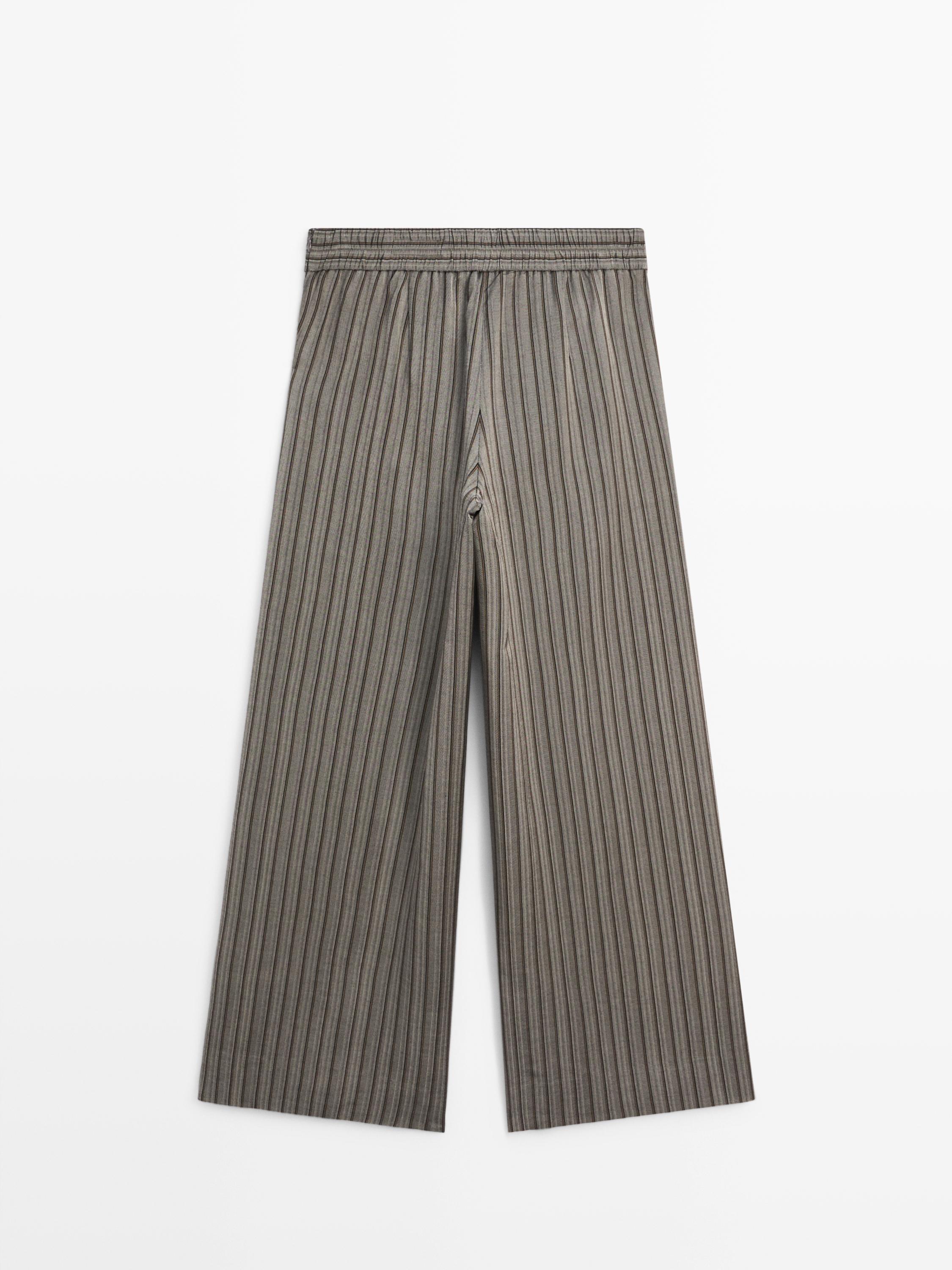 Wide-leg trousers with striped details