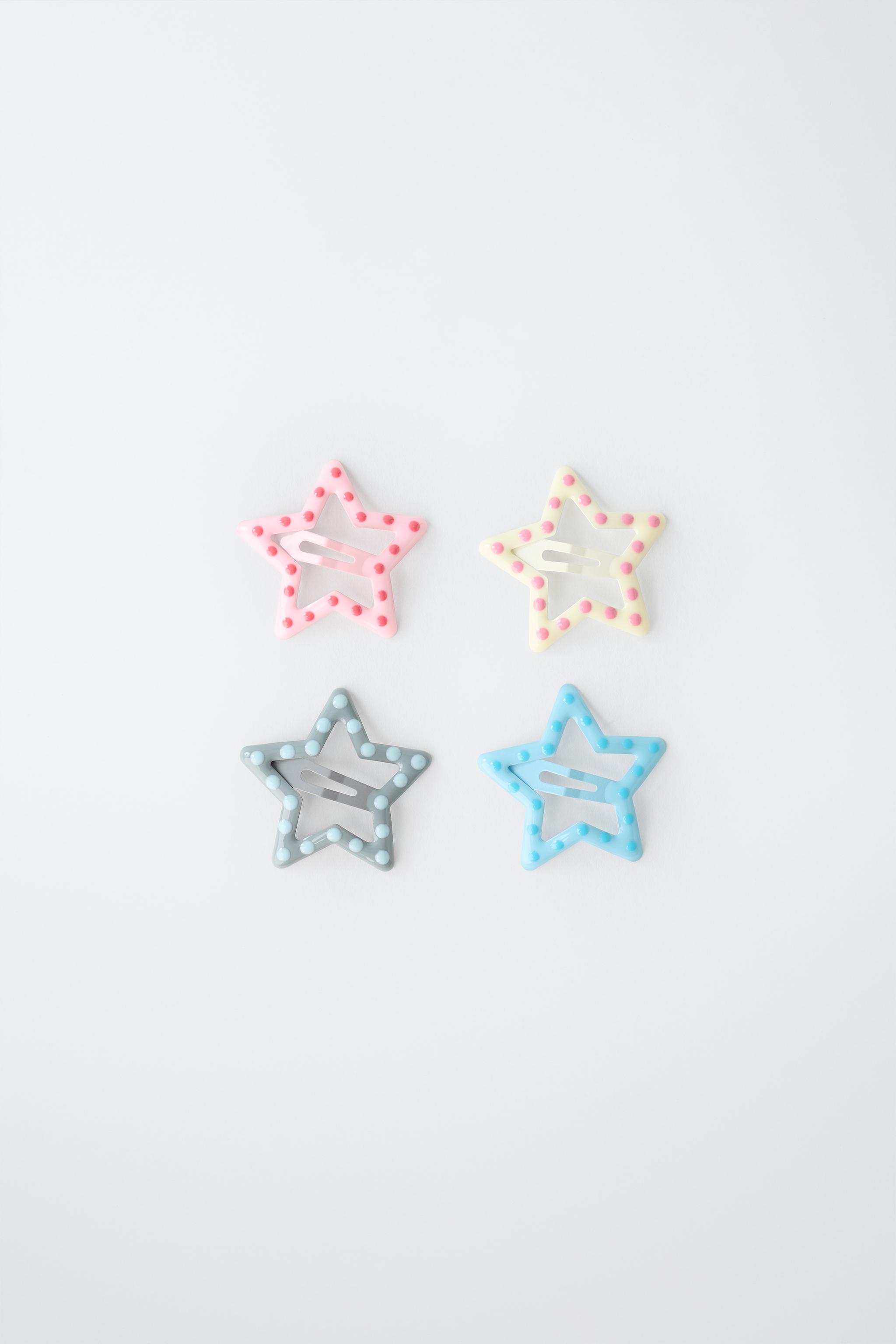 LOT DE QUATRE BARRETTES ÉTOILES À POIS