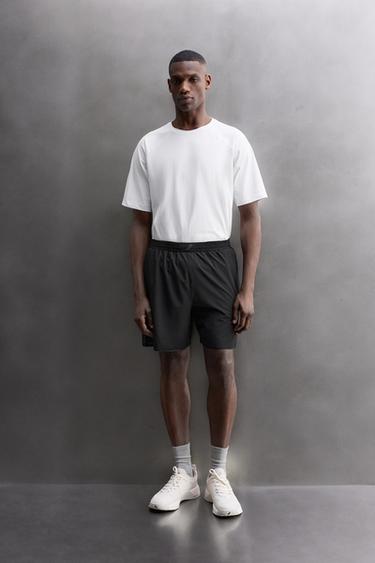 PANTALONES CORTOS COMBINADO PERFORADO - Negro de Zara - Imagen 0