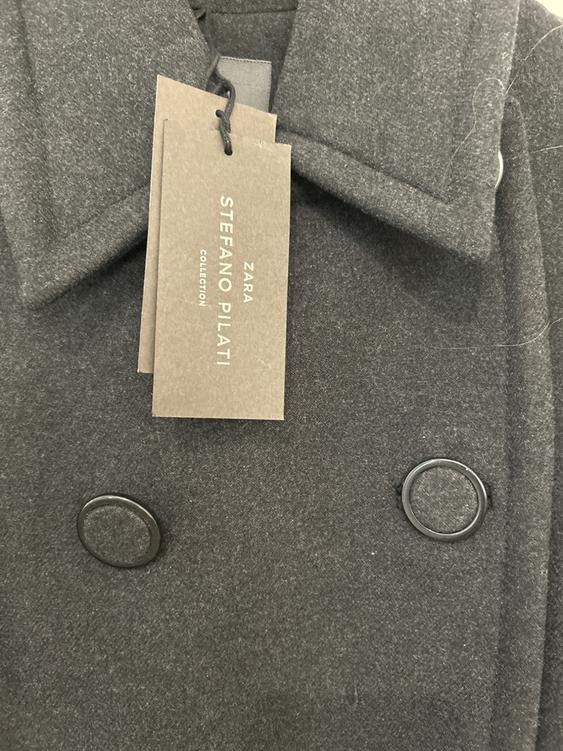 Dark grey coat with wide lapels and large buttons. Swing tag reads "ZARA STEFANO PILATI COLLECTION".