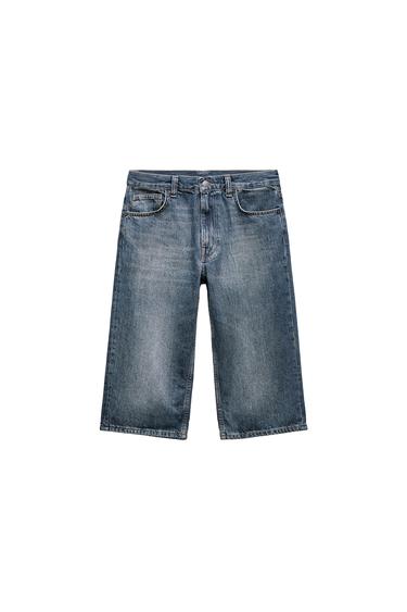 Front view of blue denim shorts with front and back pockets.