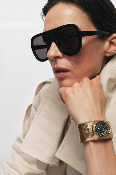 BRACELET MÉTALLIQUE TRAVAILLÉ ET BRILLANT - Doré de Zara