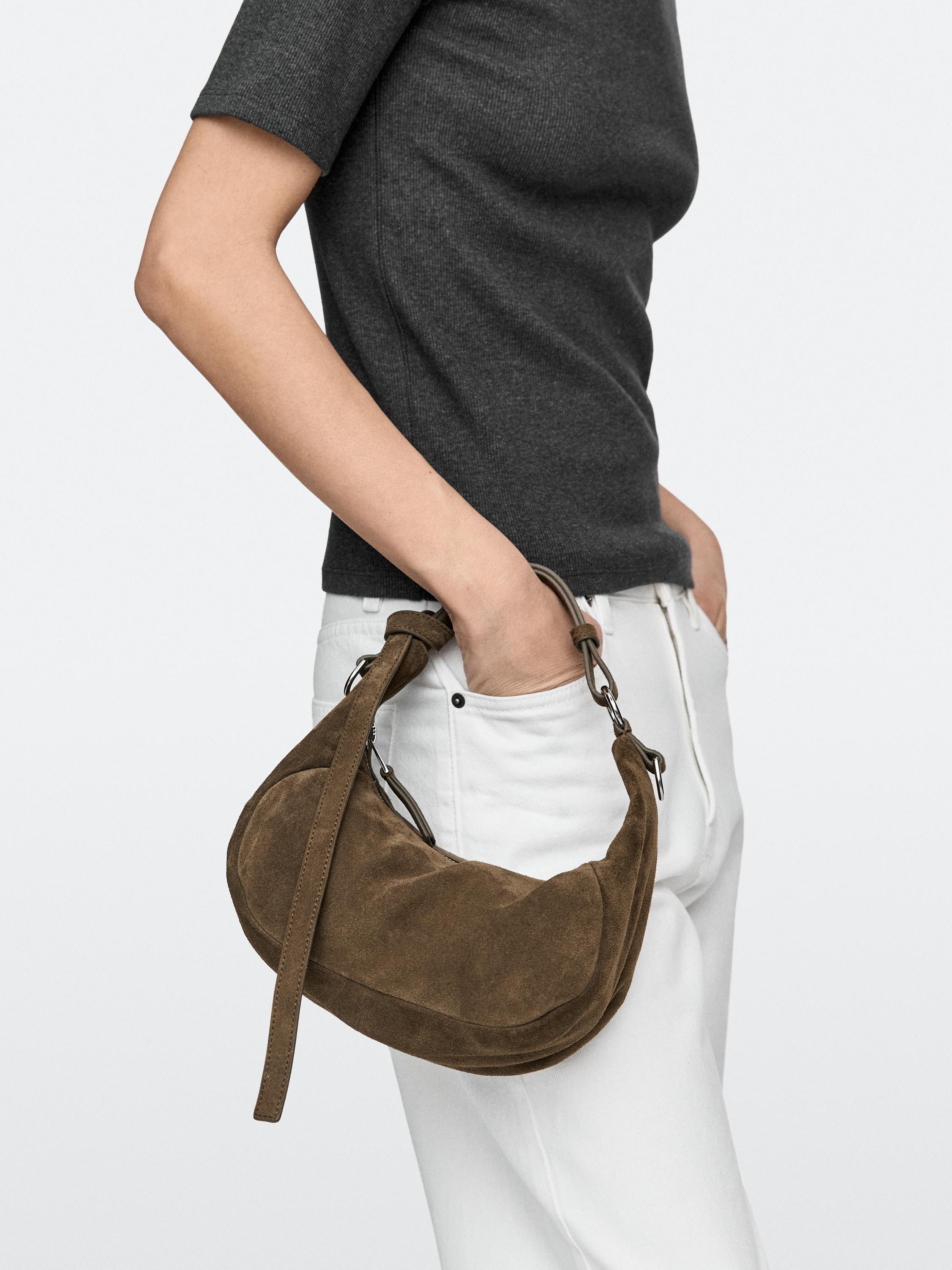 Split leather bag with metal buckle