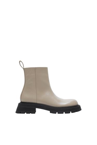 FLAT LEATHER ANKLE BOOTS WITH TRACK SOLES