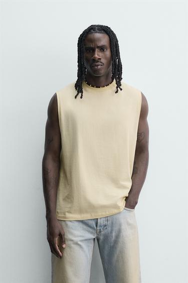 МАЙКА С ЭФФЕКТОМ ПОТЕРТОСТИ — СВЕТЛО-ЖЕЛТЫЙ от Zara