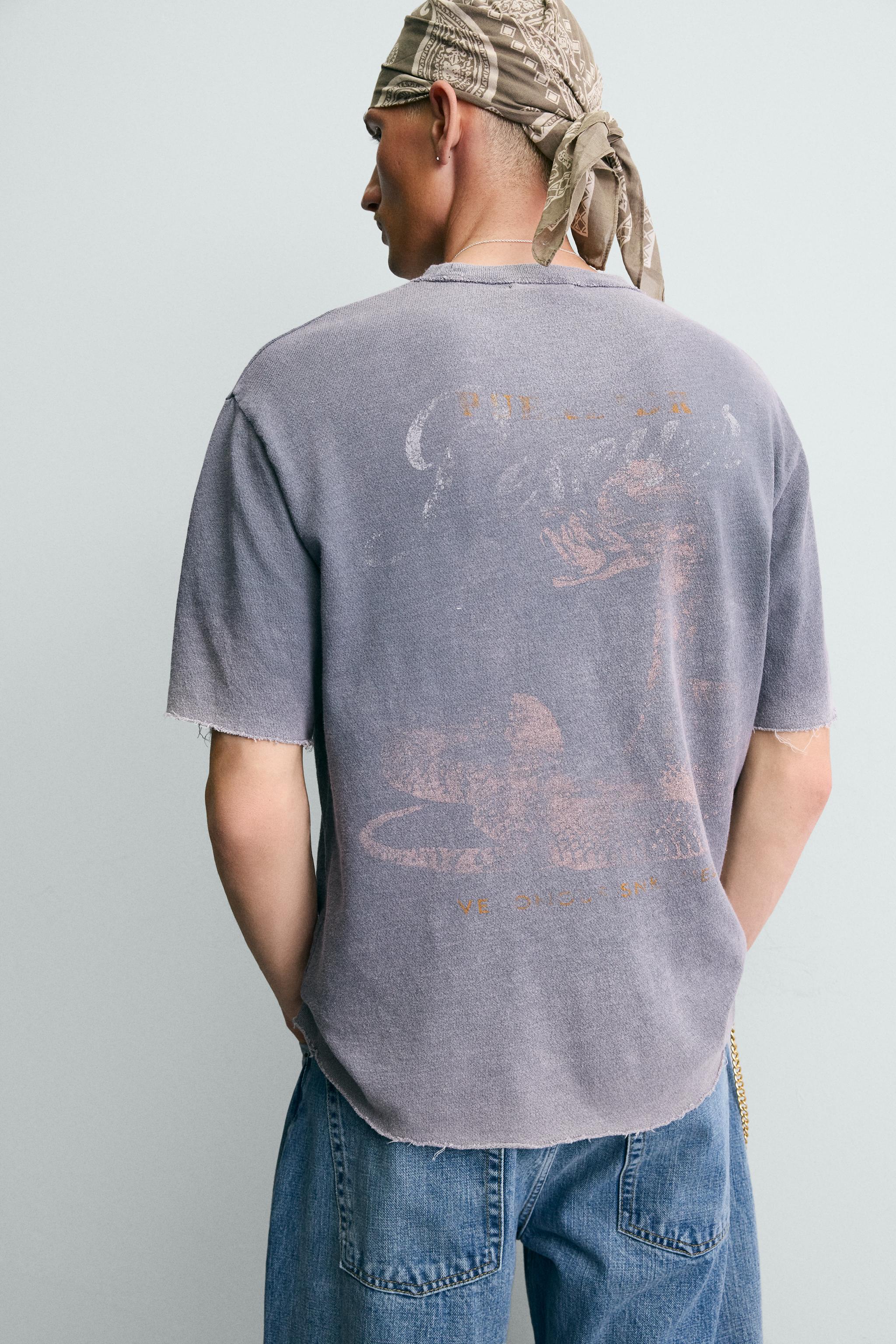 T-SHIRT EN MAILLE RELAXED FIT DÉLAVÉ