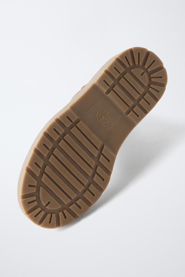 Botines Chelsea de cuero 7