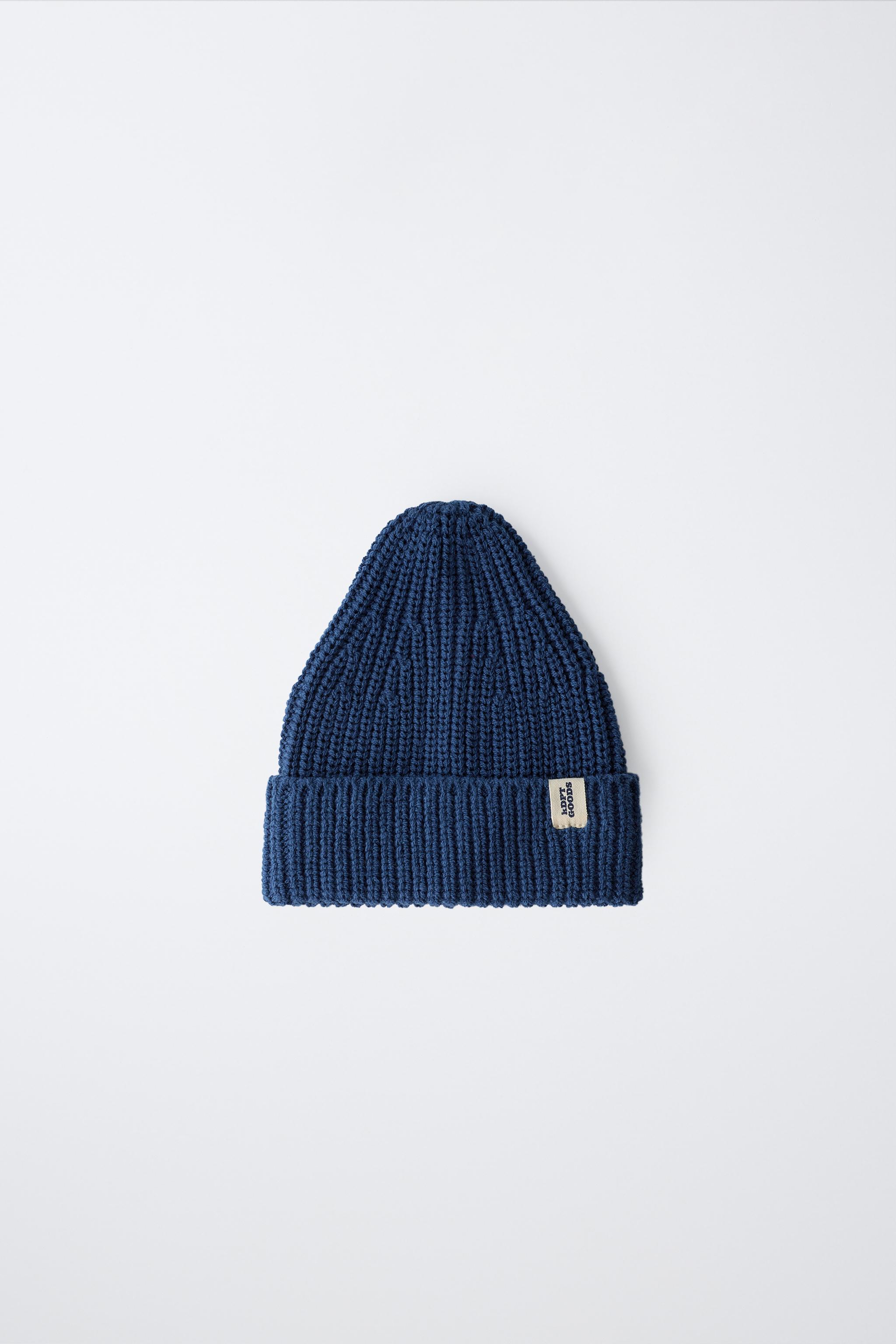 BONNET EN MAILLE À ÉTIQUETTE