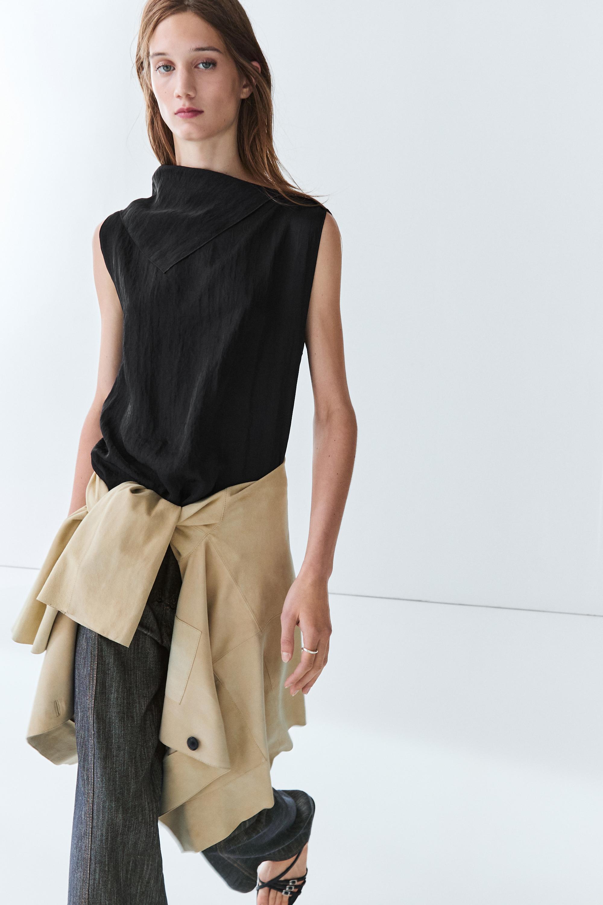 Flowing lace-detail top
