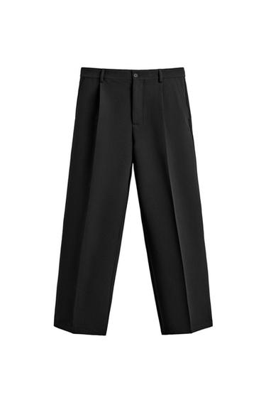 SKRAJŠANE HLAČE S ŠIROKIMI HLAČNICAMI IN VOLANČKI - Črna od Zare