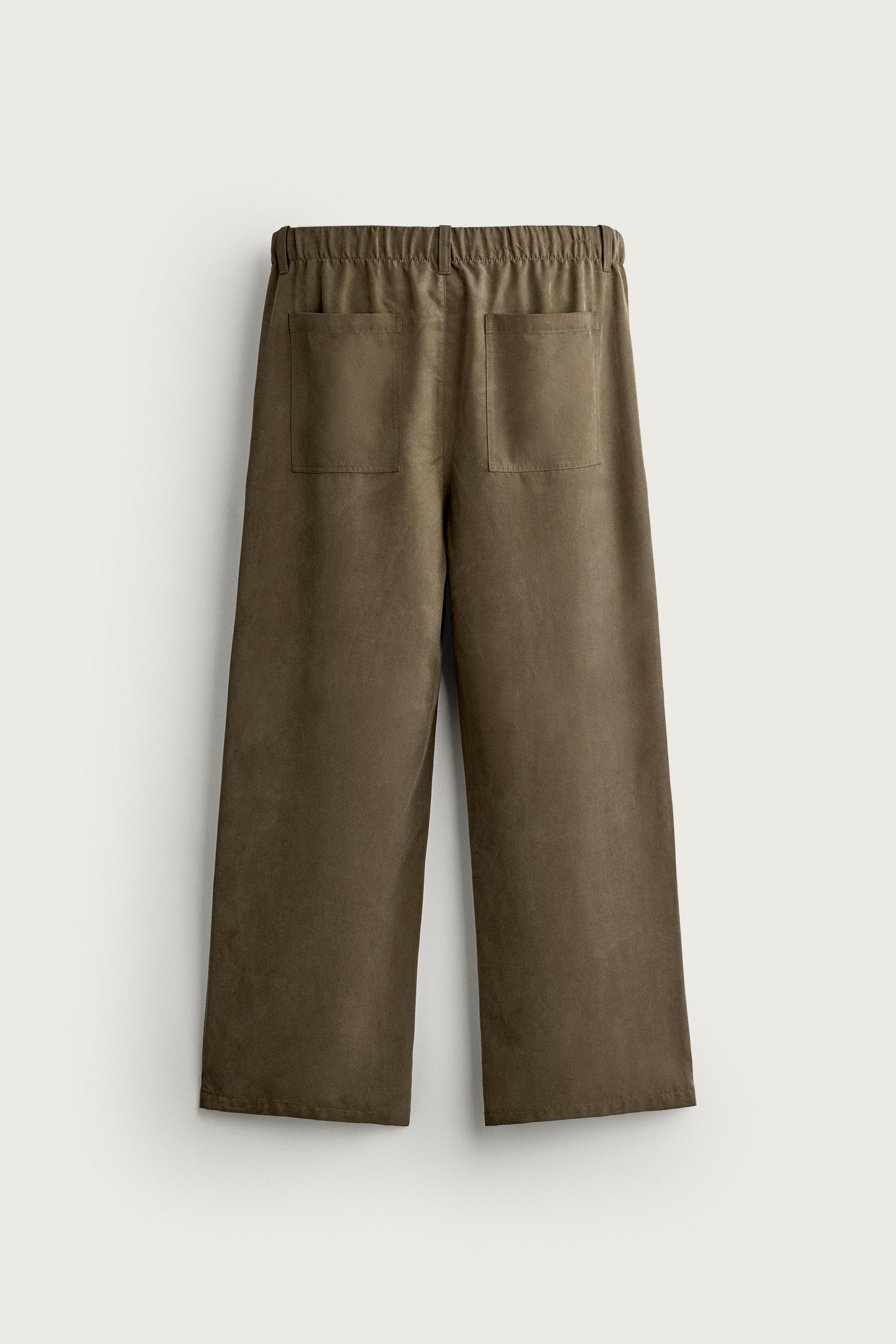 RELAXED FIT FLOWY PANTS
