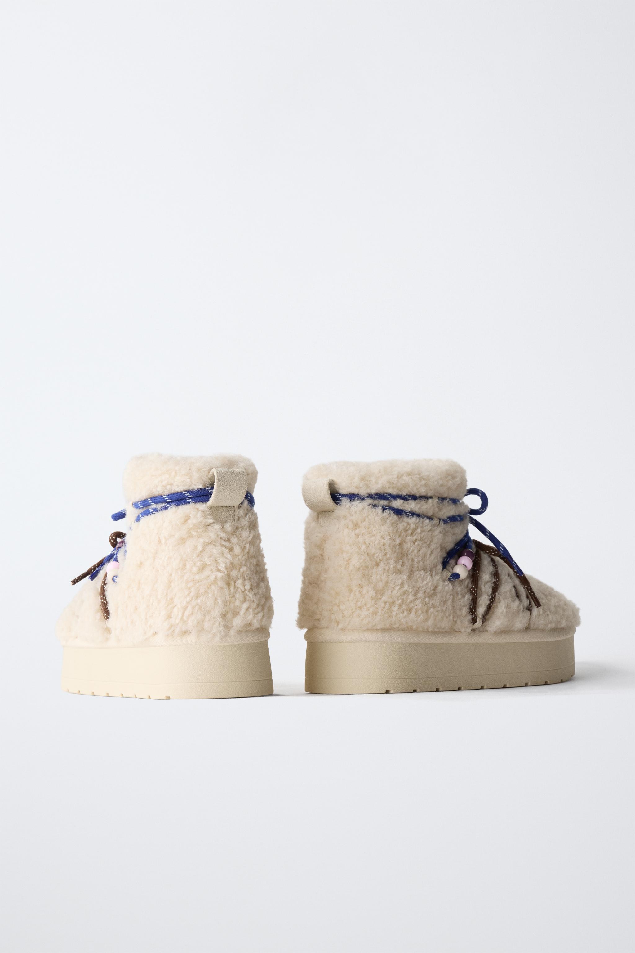 SHEARLING CHARMS ANKLE BOOTS