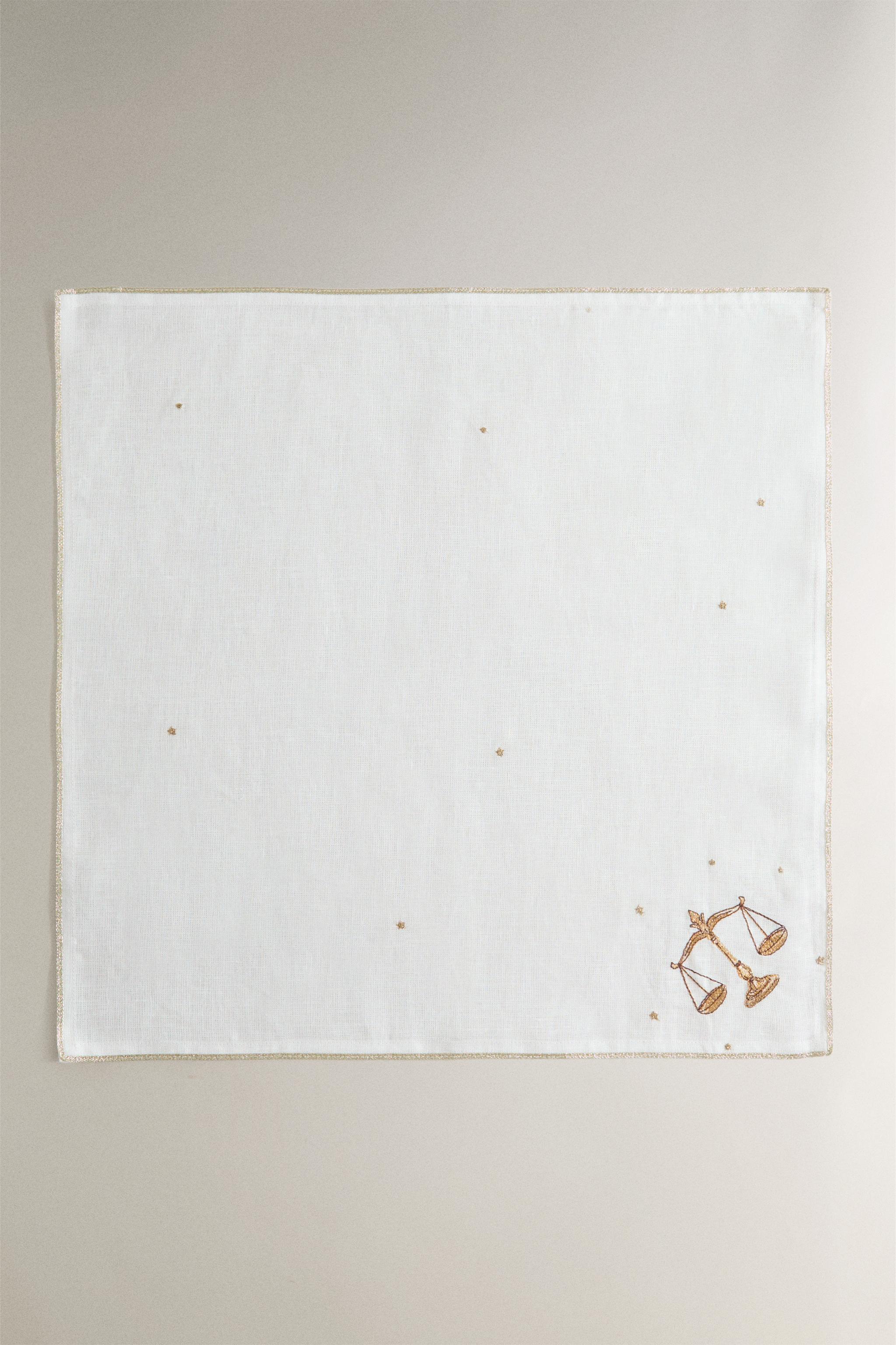 LIBRA EMBROIDERED LINEN NAPKIN | MARISA BERENSON — Ecru