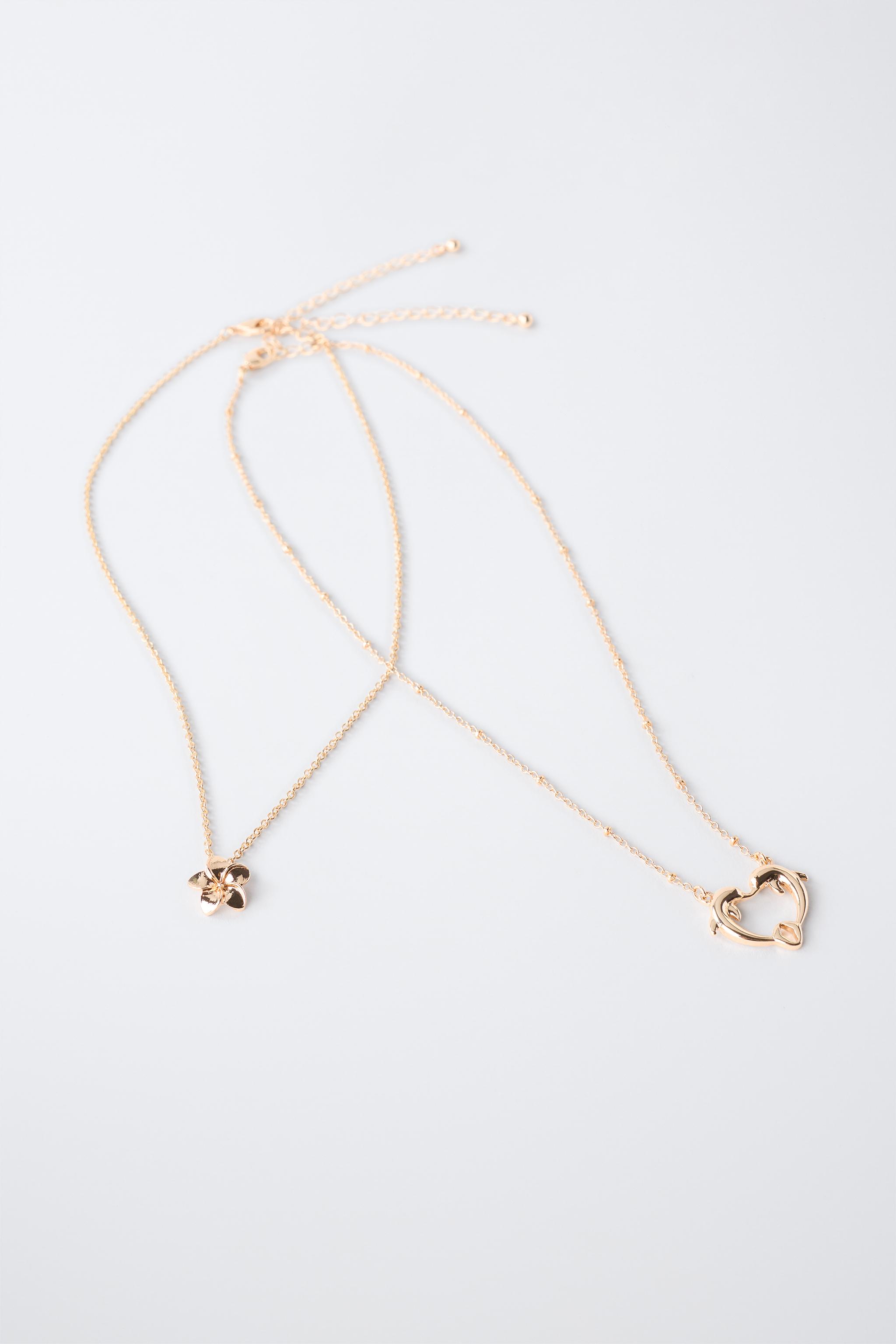 Детские аксессуары Zara TWO-PACK OF DOLPHIN AND HIBISCUS PENDANT NECKLACES — фото 4