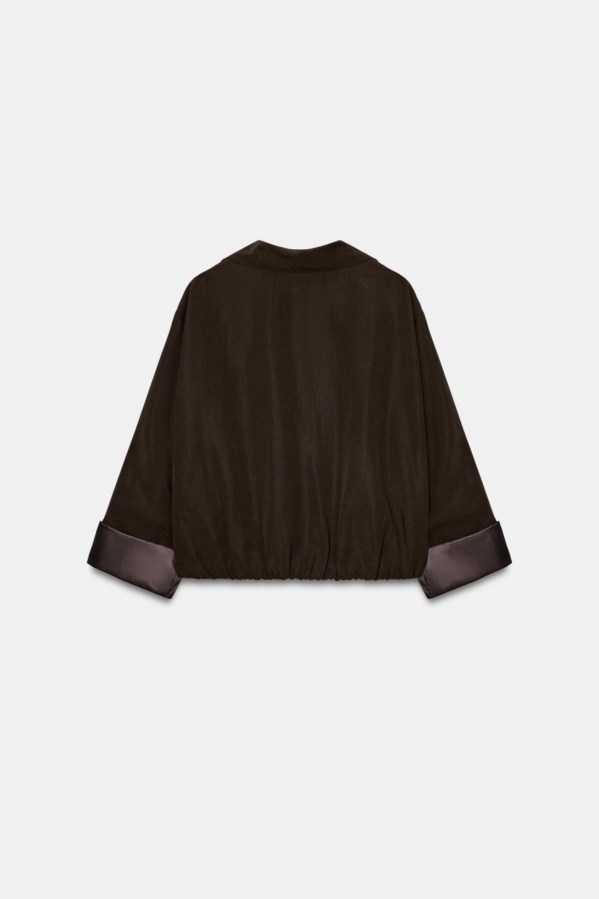 VESTE COURTE À BAS ÉLASTIQUE
