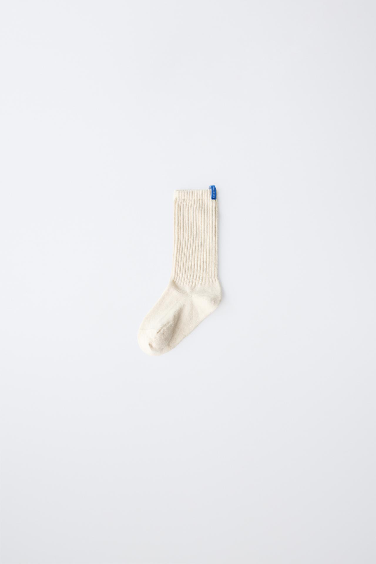 RIBBED MID-CALF SOCKS WITH LABEL — Ecru