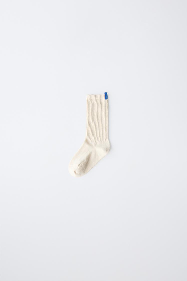 RIBBED MID-CALF SOCKS WITH LABEL — Ecru
