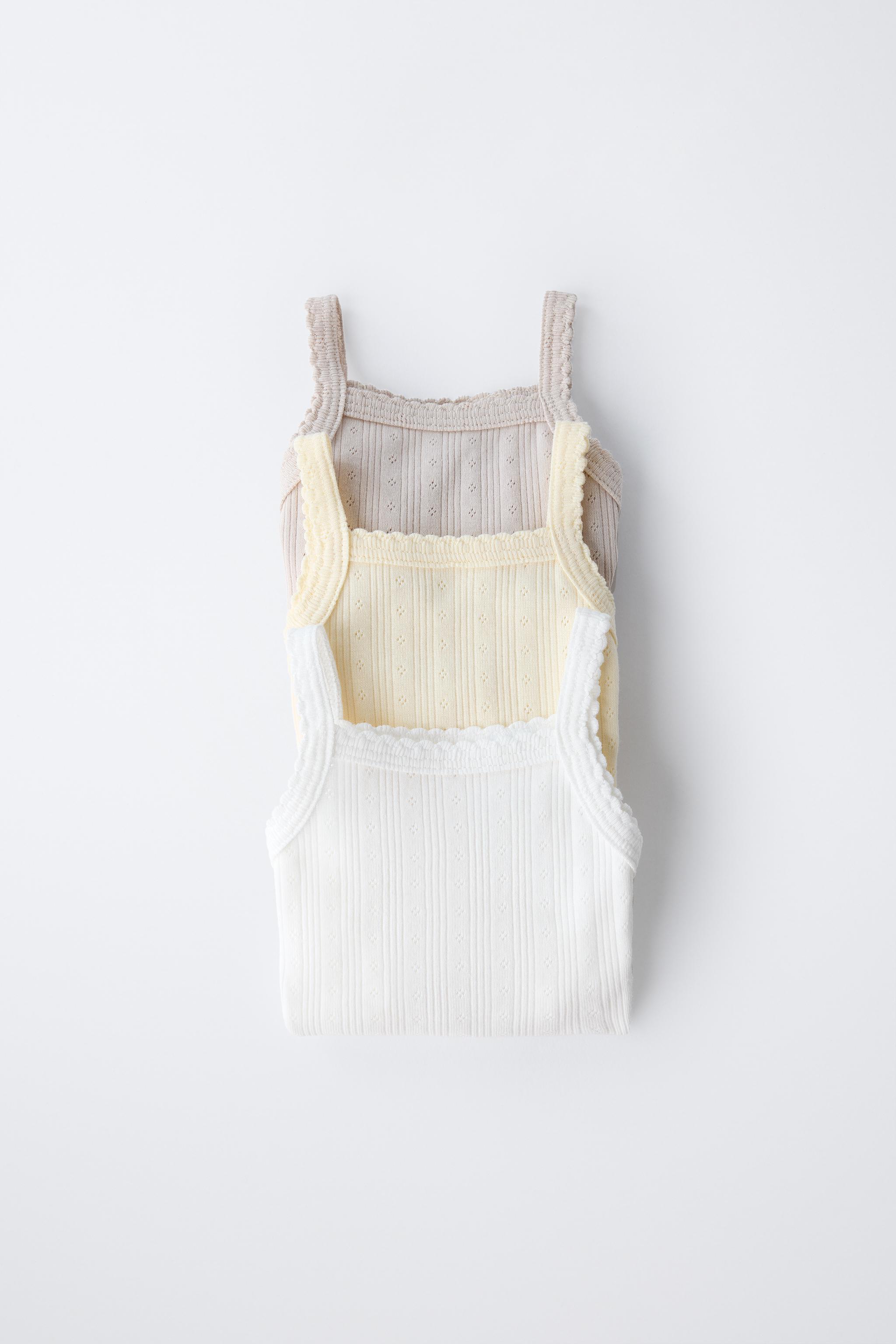 THREE-PACK OF RIB KNIT BODYSUITS WITH CUTOUT DETAIL - Yellow