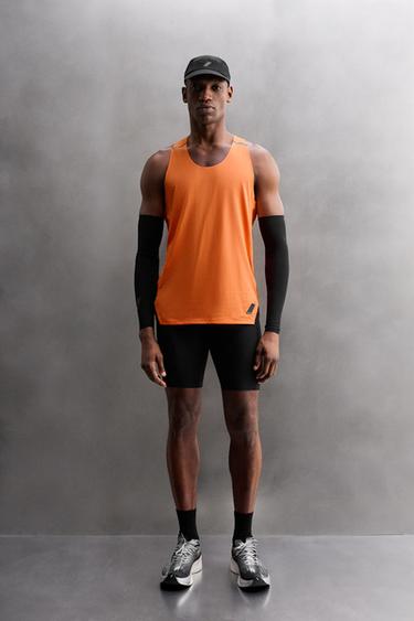 TEHNIČNA MAJICA BREZ ROKAVOV Z BARVNIM BLOKOM - Oranžni od Zare