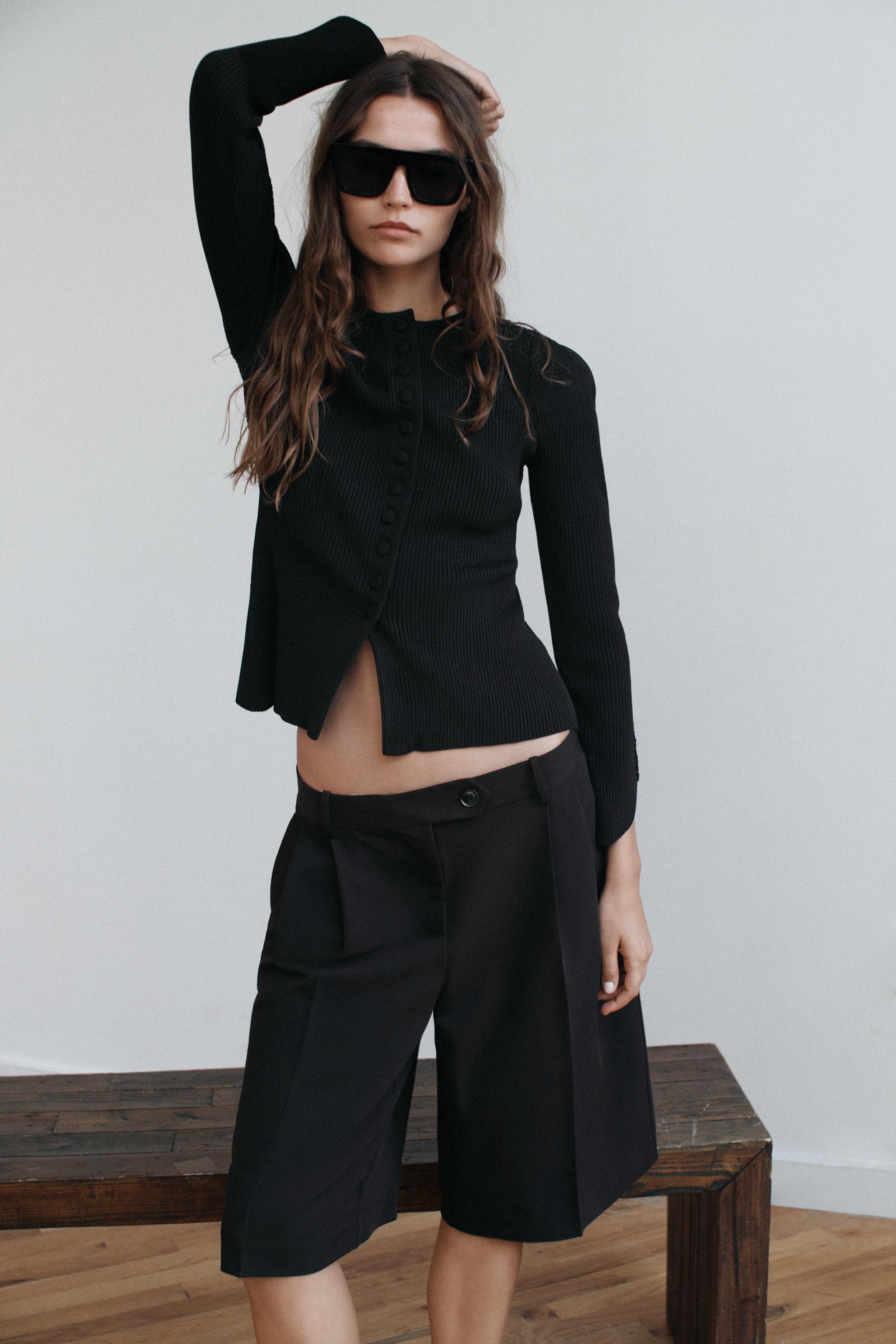 VESTE EN MAILLE À MANCHES BOUFFANTES