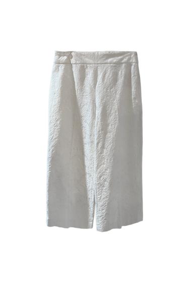 WHITE PANTS WITH FLORAL PATTERN
