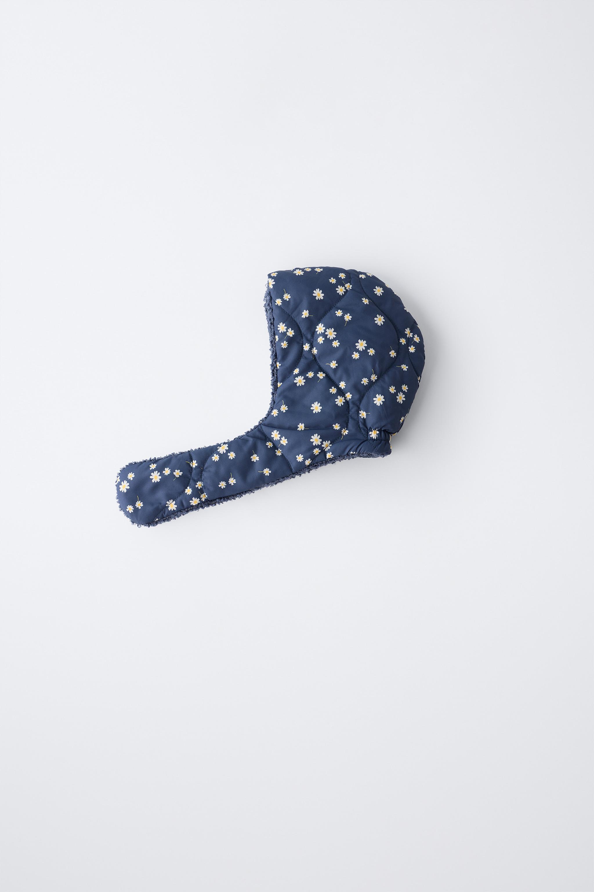 DAISY PRINT QUILTED HOOD