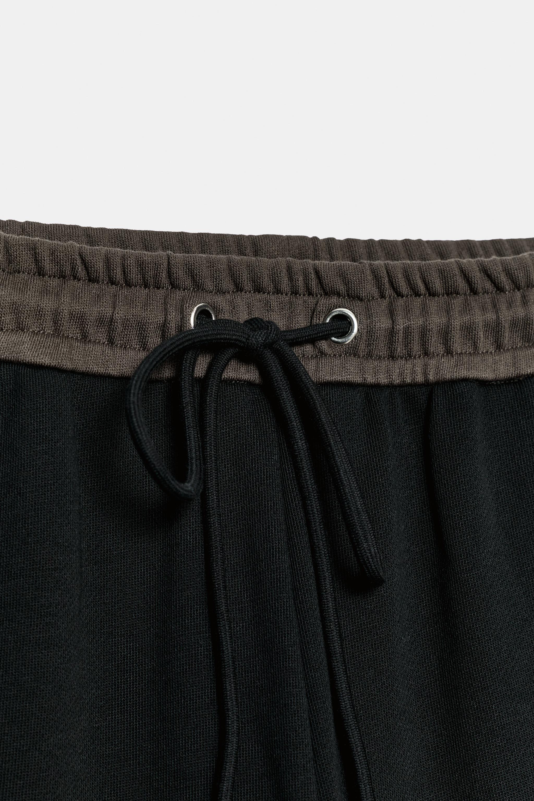 PANTALON EN MOLLETON COMBINÉ
