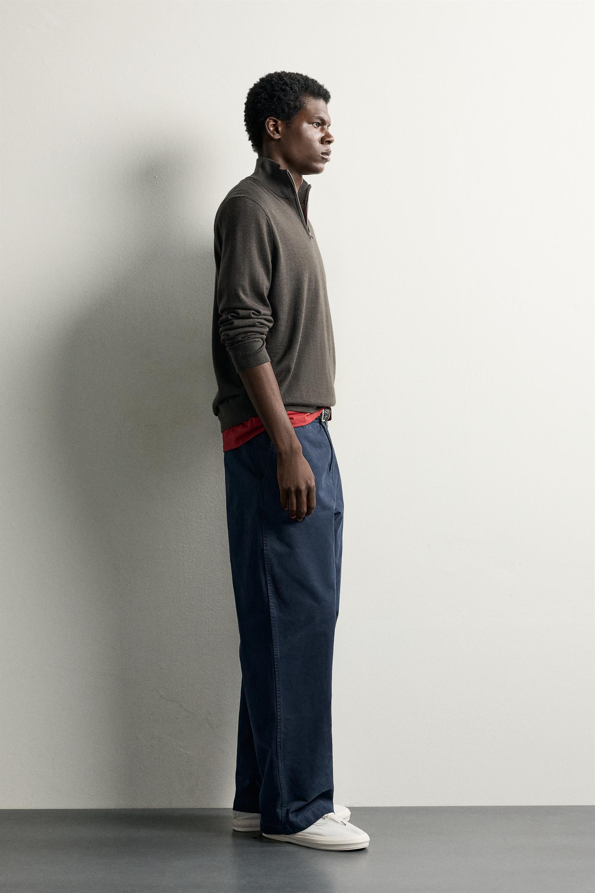 100% WOOL QUARTER-ZIP SWEATER