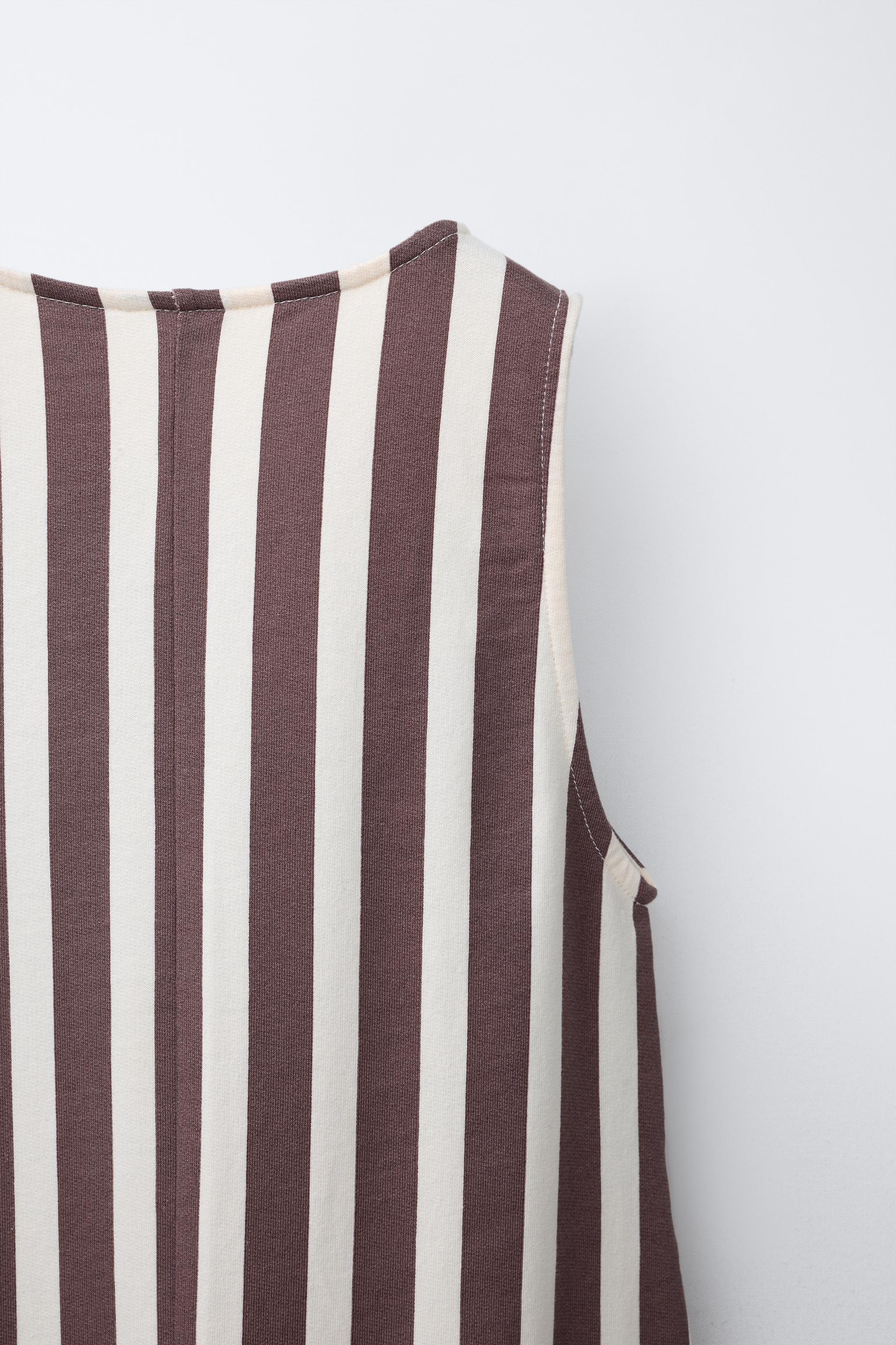 LONG STRIPED OVERALLS WITH EMBOSSED TEXT