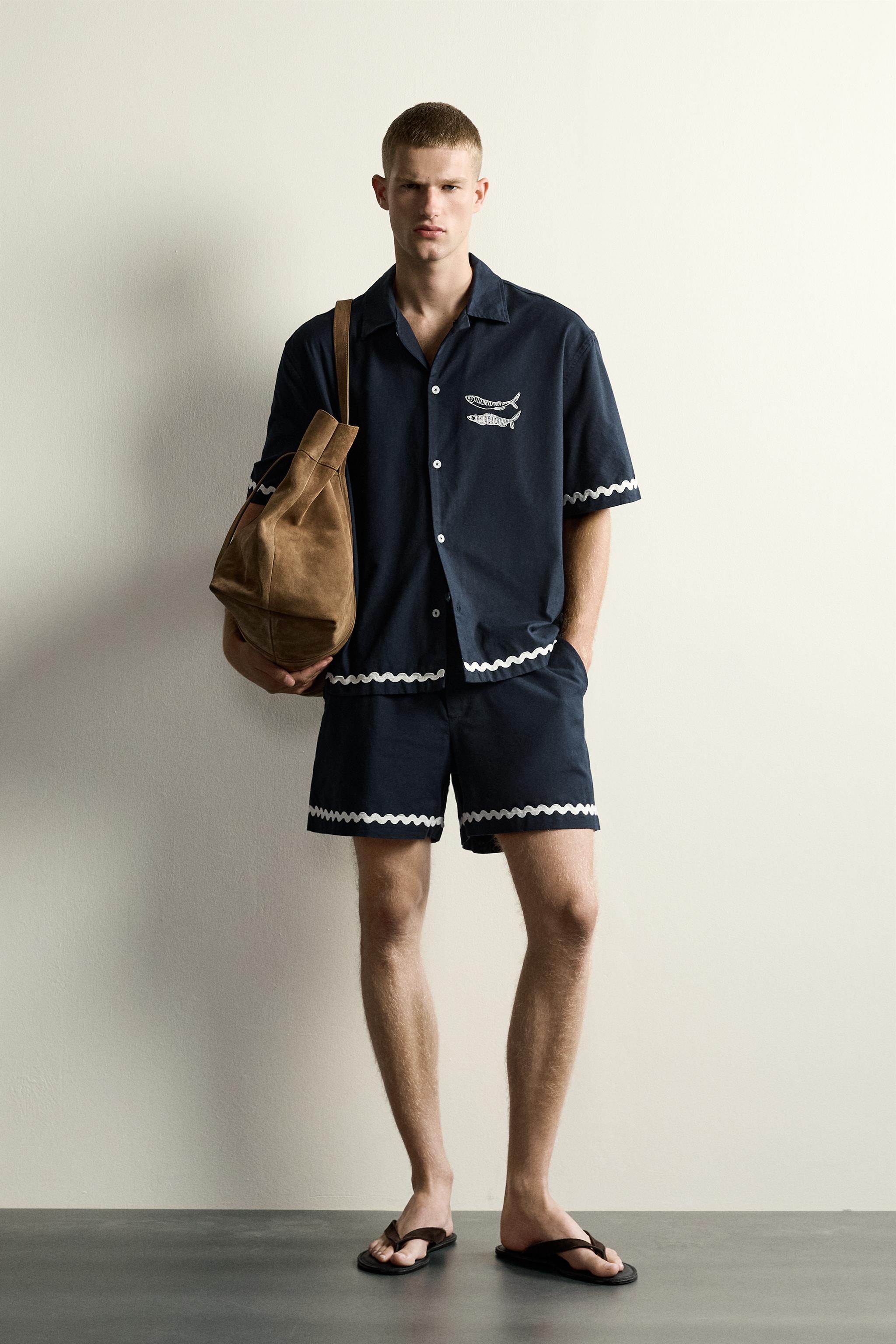 SHORT COURT BRODERIE POISSON