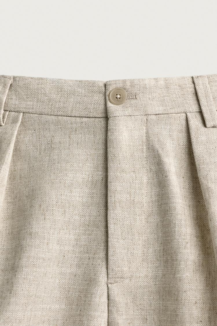 PANTALÓN CON PLIEGUES RELAXED FIT TEXTURIZADO 8