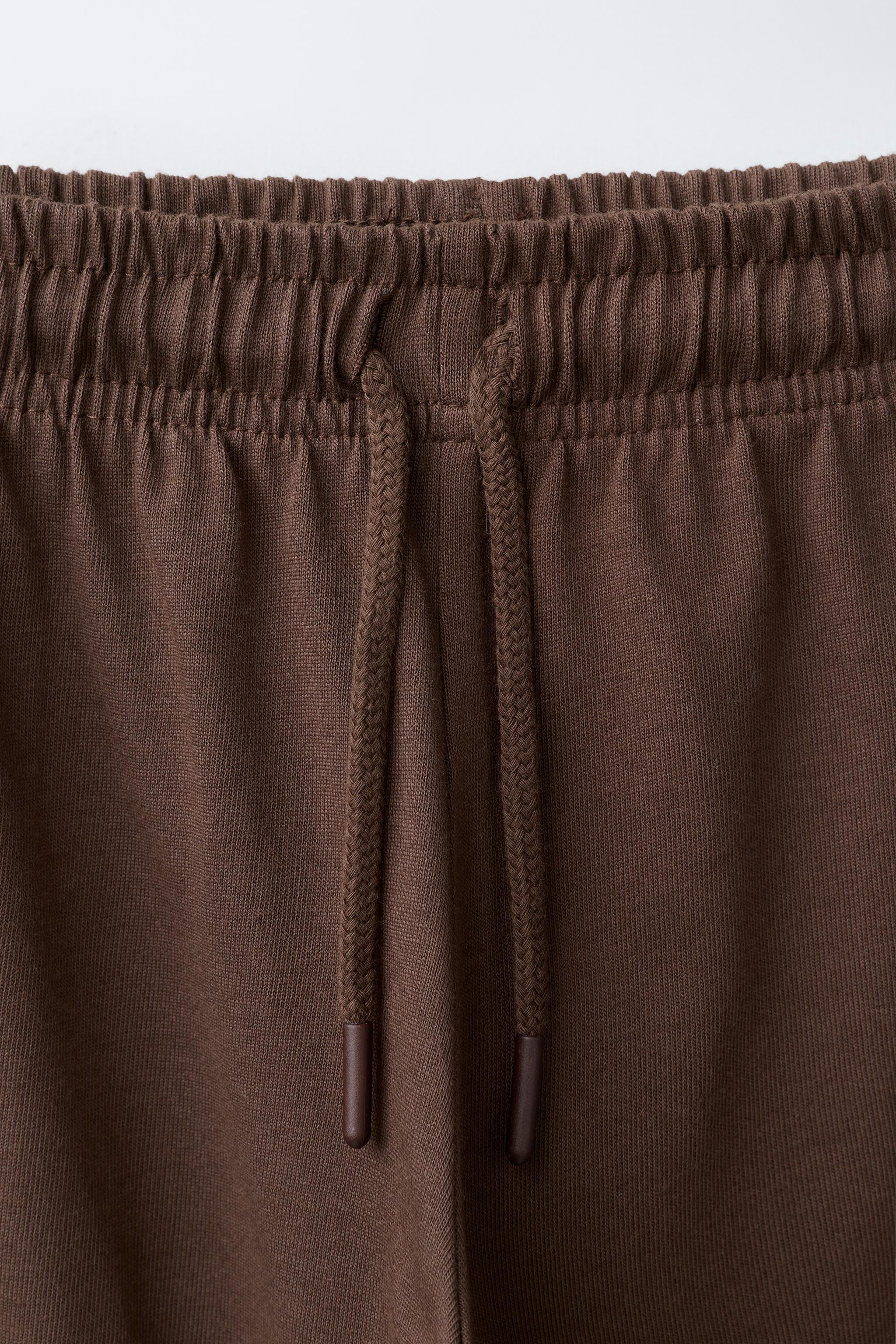 PANTALON WIDE LEG À BANDES