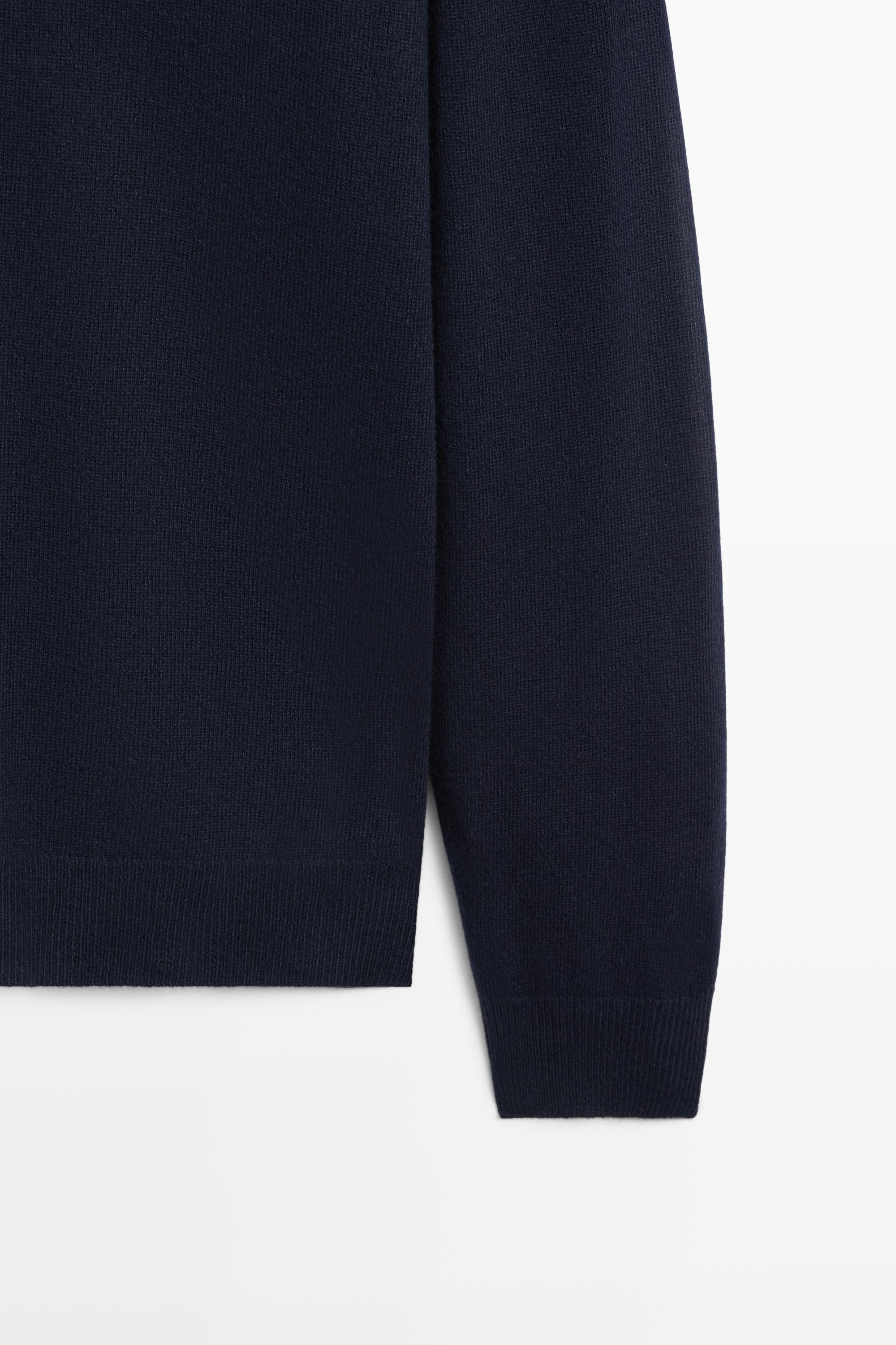 Pull en maille col montant zippé