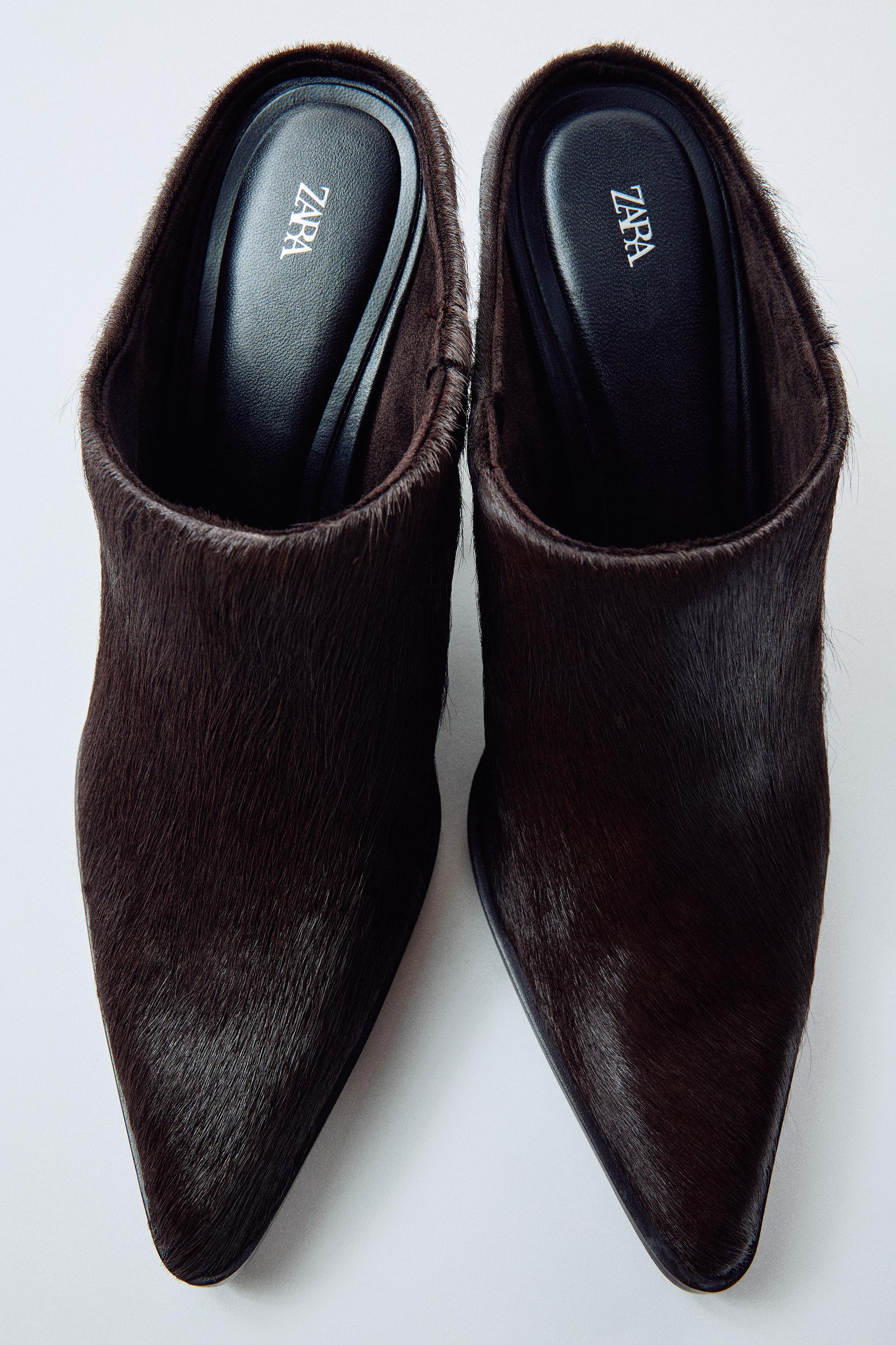 LEATHER AND SHEEPSKIN HEELED MULES