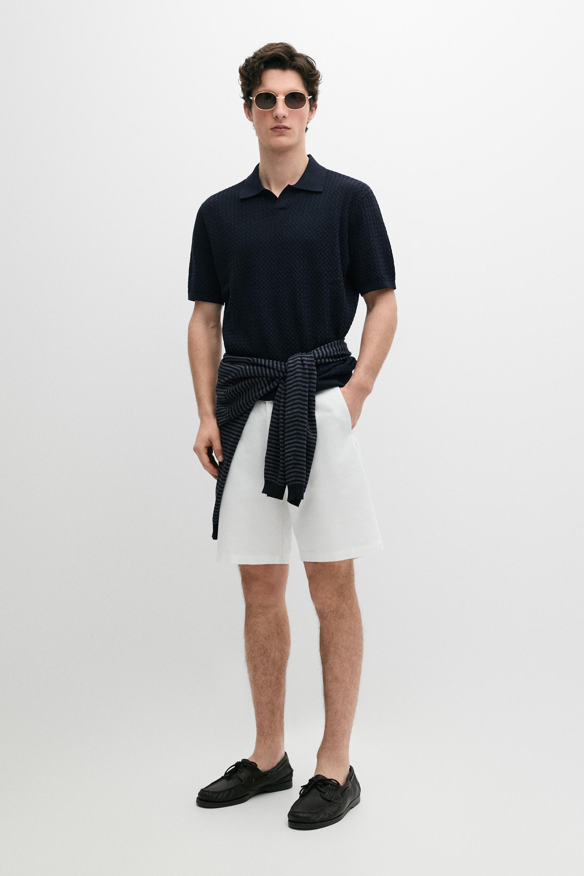 Polo en maille torsadée à col V