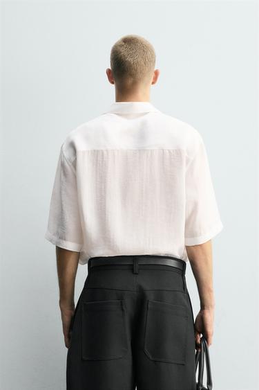CAMISA POLO FLUIDA - Blanco de Zara