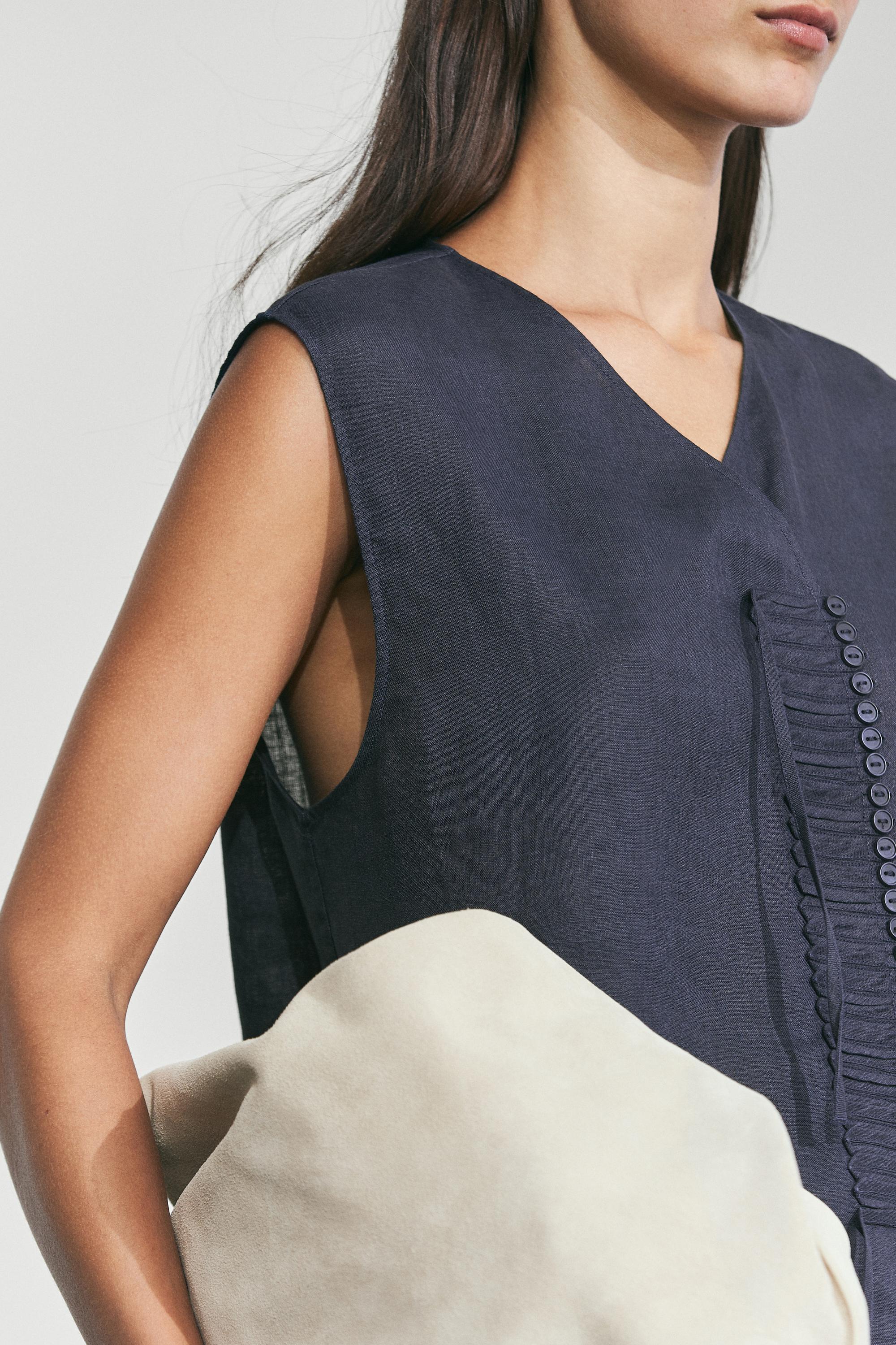 100% linen crossover top with button detail