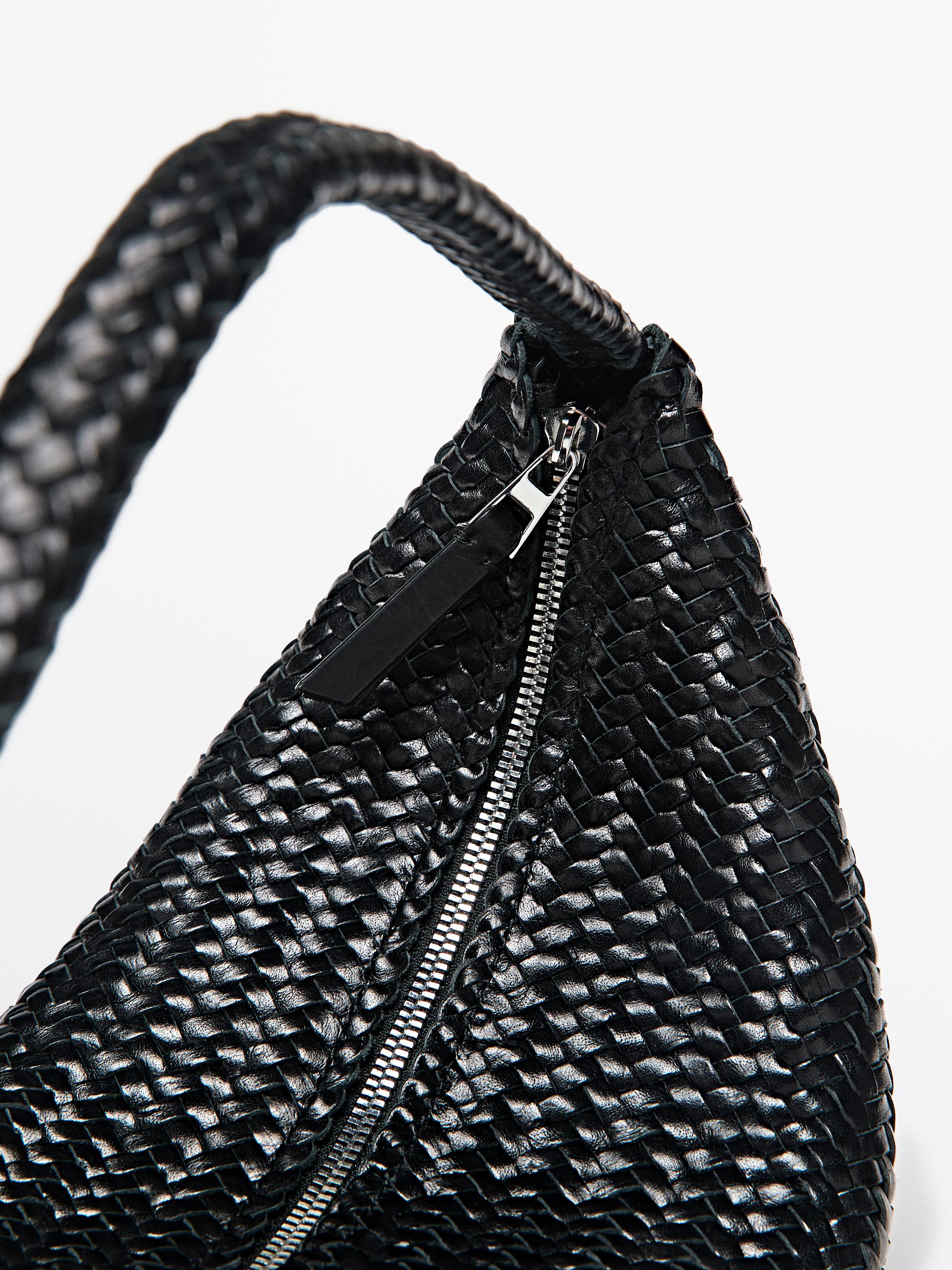 Braided leather half-moon bag