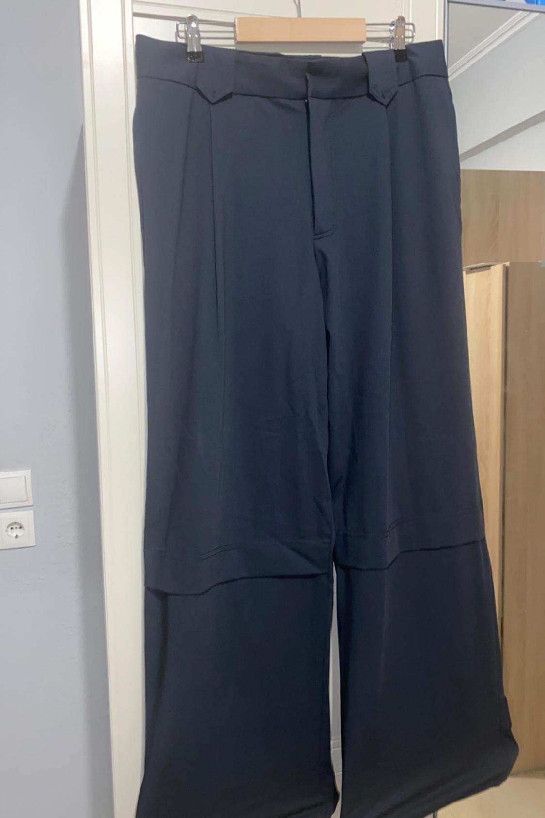 PLEATED TROUSERS