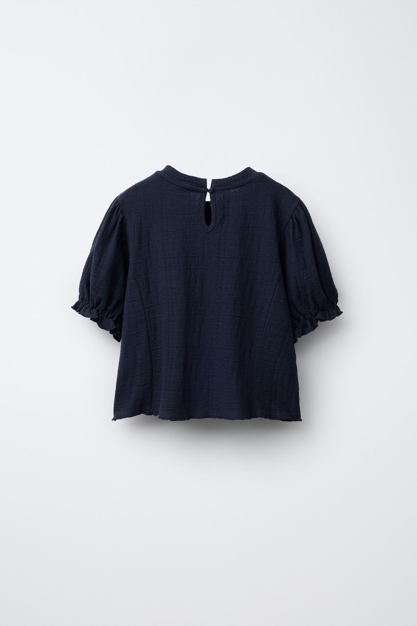 TEXTURED OVERSIZED BLOUSE