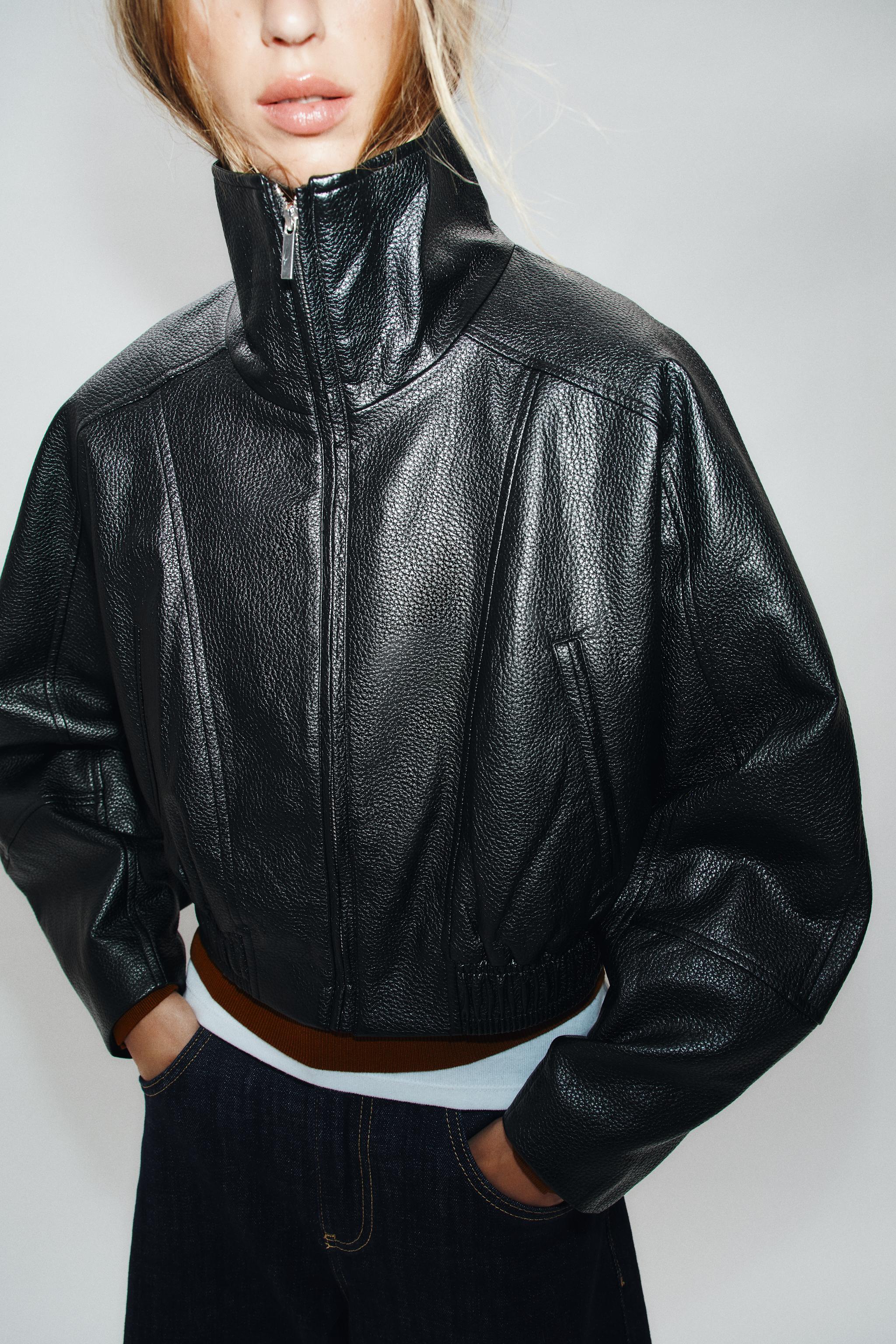 BLOUSON COURT EN MATIÈRE SYNTHÉTIQUE