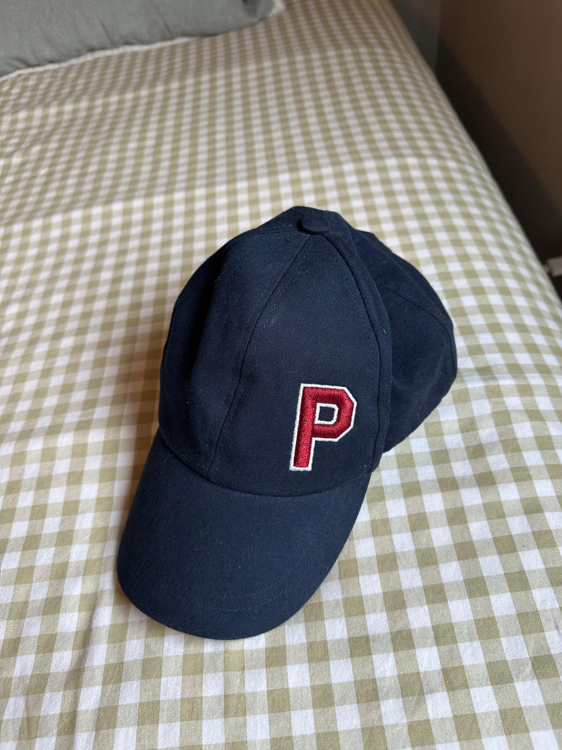 CAP WITH INITIAL