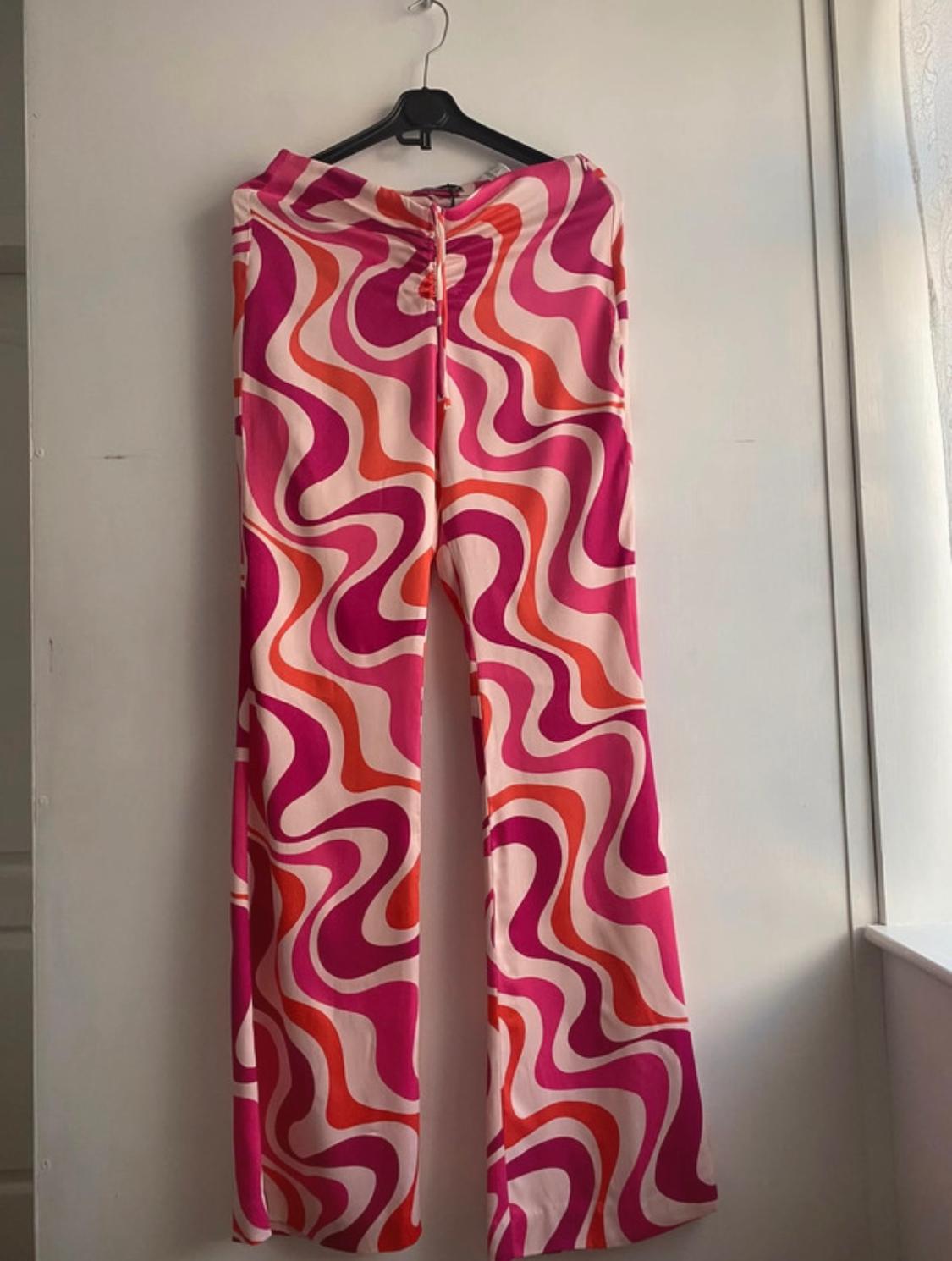 FLARE PRINTED TROUSERS