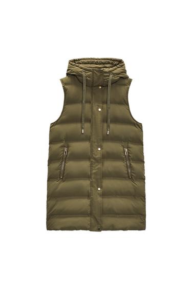 Front view of a green padded gilet with a hood and side zip pockets.