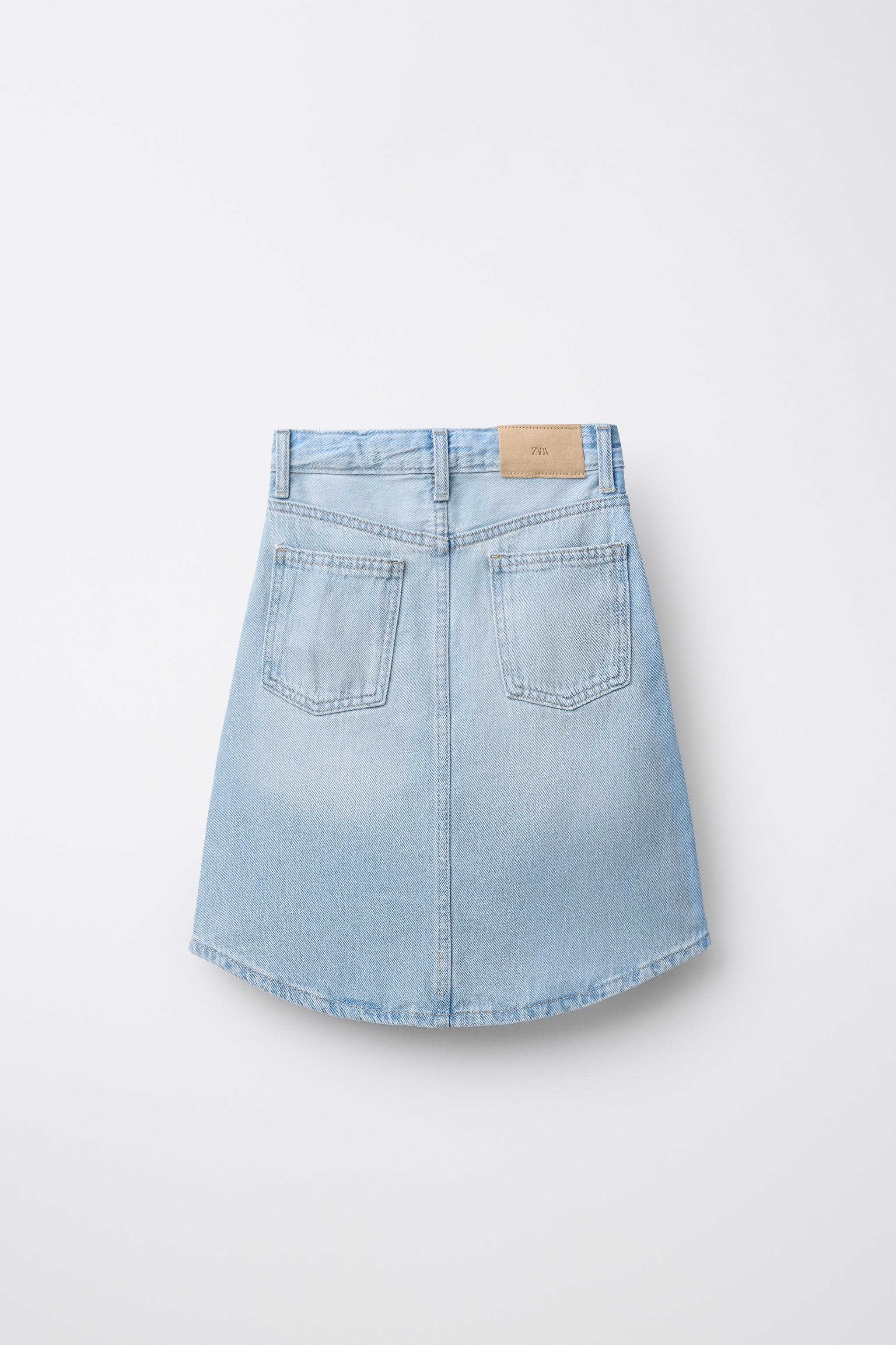 JUPE EN JEAN MI-LONGUE À BOUTONS